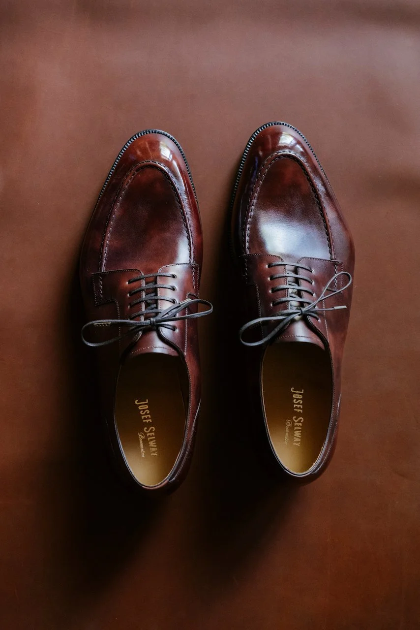 2026: Apron front derby in cognac museum calf.