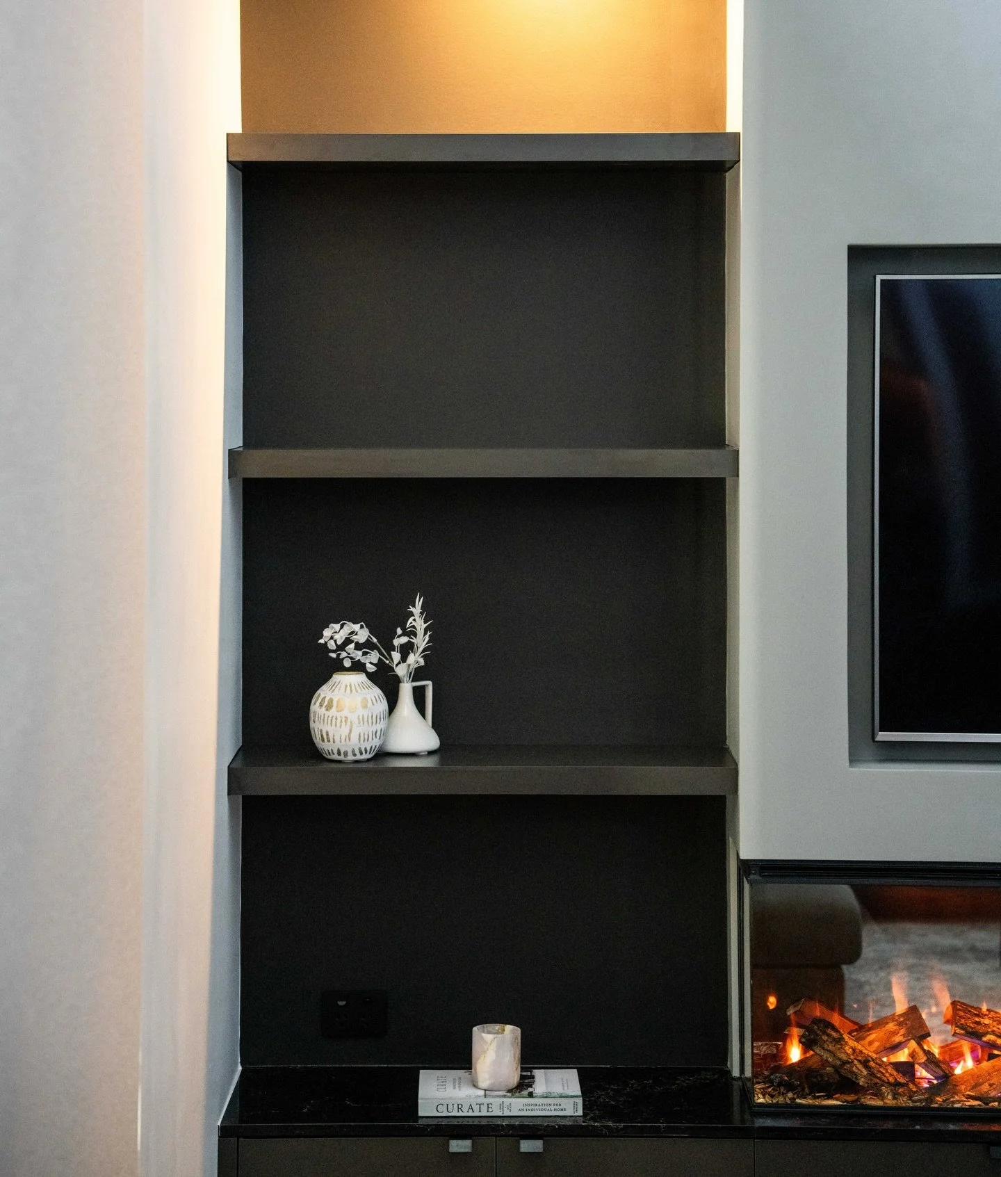 A sleek model cabinetry finish to compliment a new 3 sided @house.of.smoke.and.fire slimline fire place. 

#renovations #canberrarenovations #g6concepts #fireplace #cabinetry #design #interiordesign #business #trade