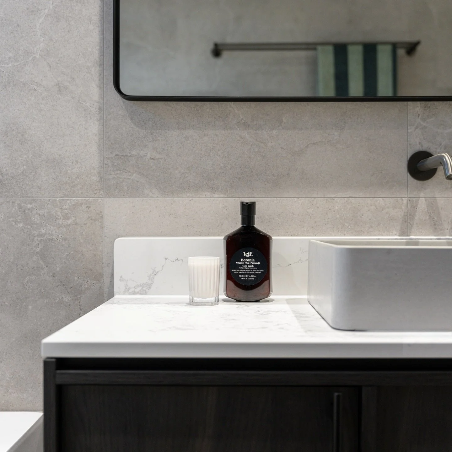 Dark. Moody. Timeless.

Charcoal greys, Bottega Oak timber, and soft whites, balanced to perfection.

Design: @g6_concepts 
Built: @g6_concepts 

#canberrarenovations #bathrooms #design #moody