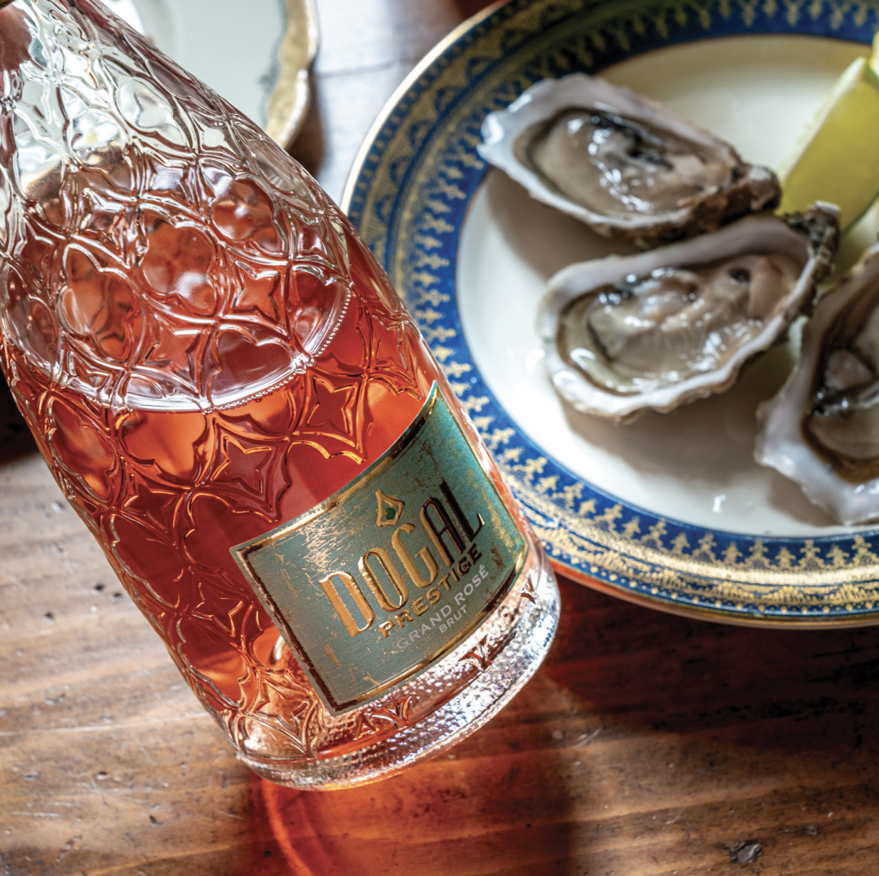 Sparkling rose and oysters.png