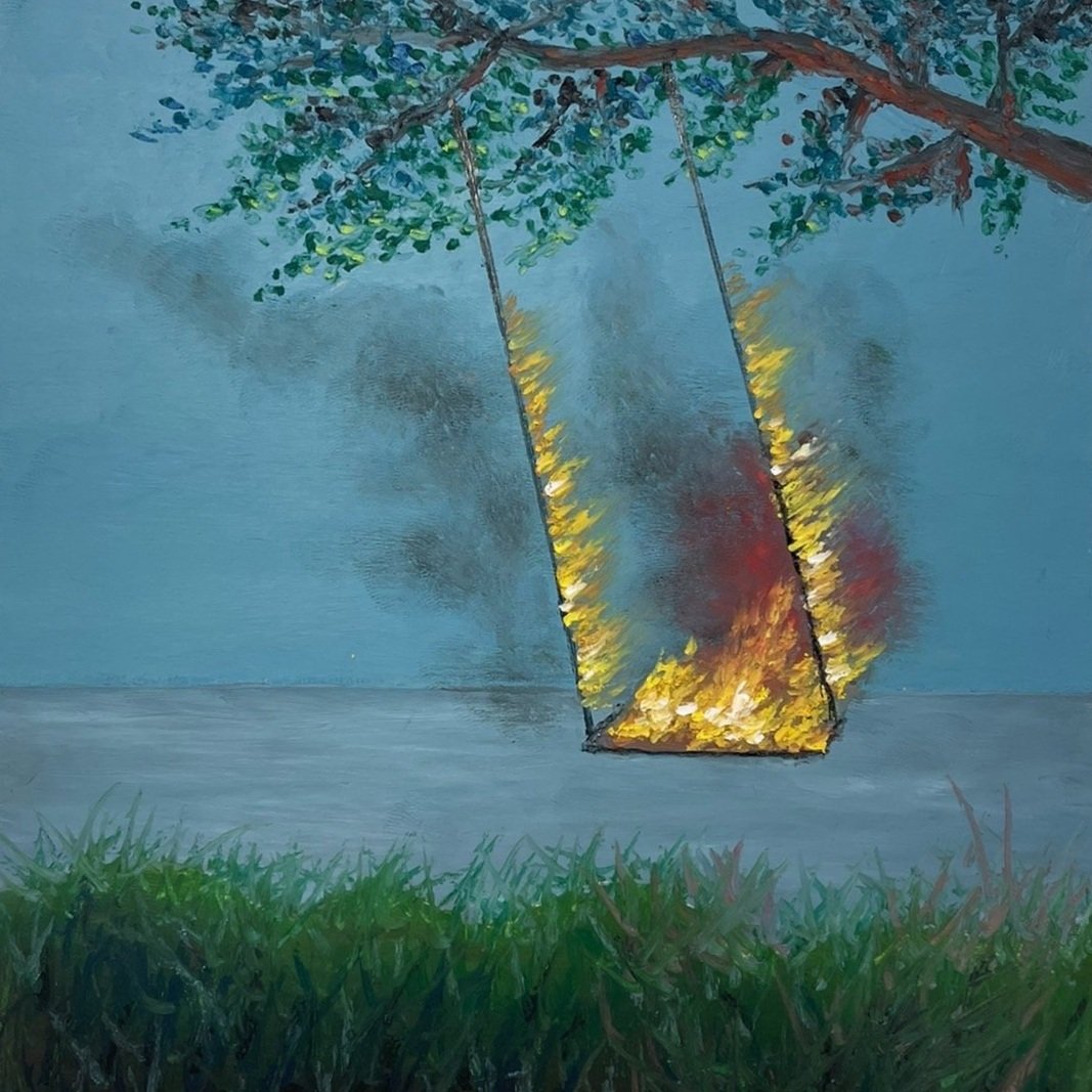 Painting of a burning swing hanging from a tree branch over grass.