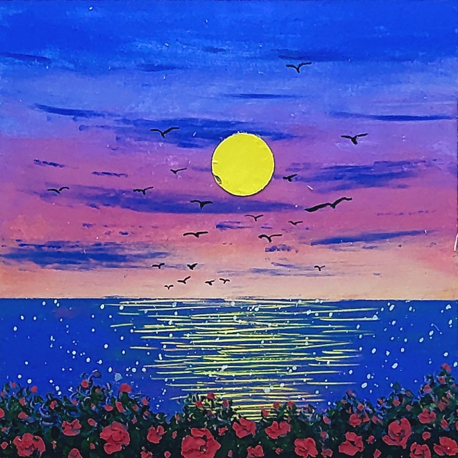 Sun setting over ocean with birds, orange and purple sky, reflecting light on water, flowers in foreground.