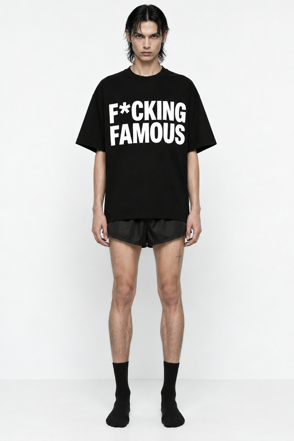 Luxury streetwear black T-shirt with bold white graphic logo print