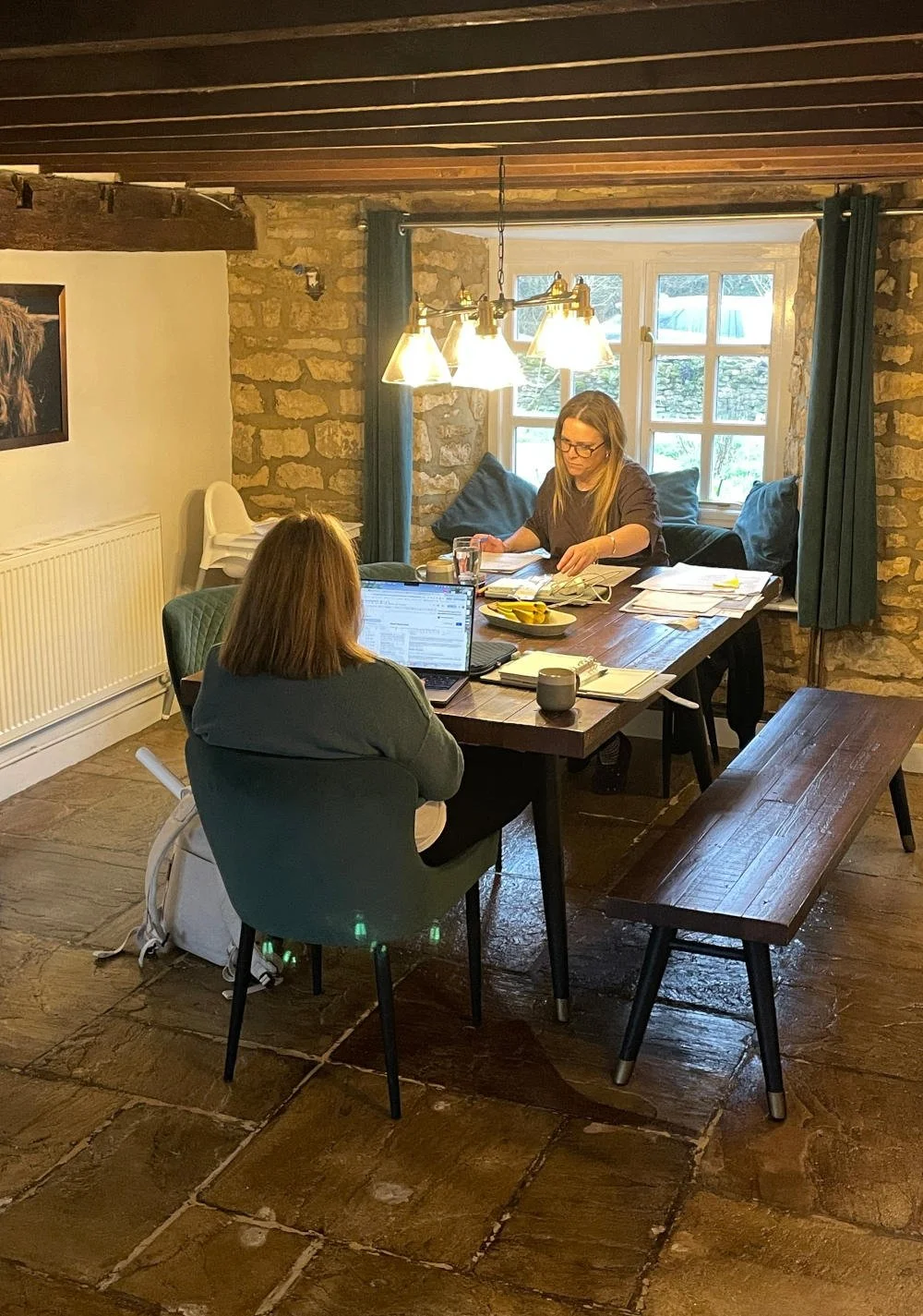 T and M working in dining room.jpg