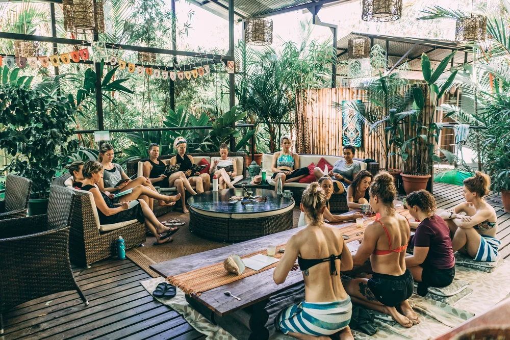 The open-air lounge at Danyasa full of retreat guests