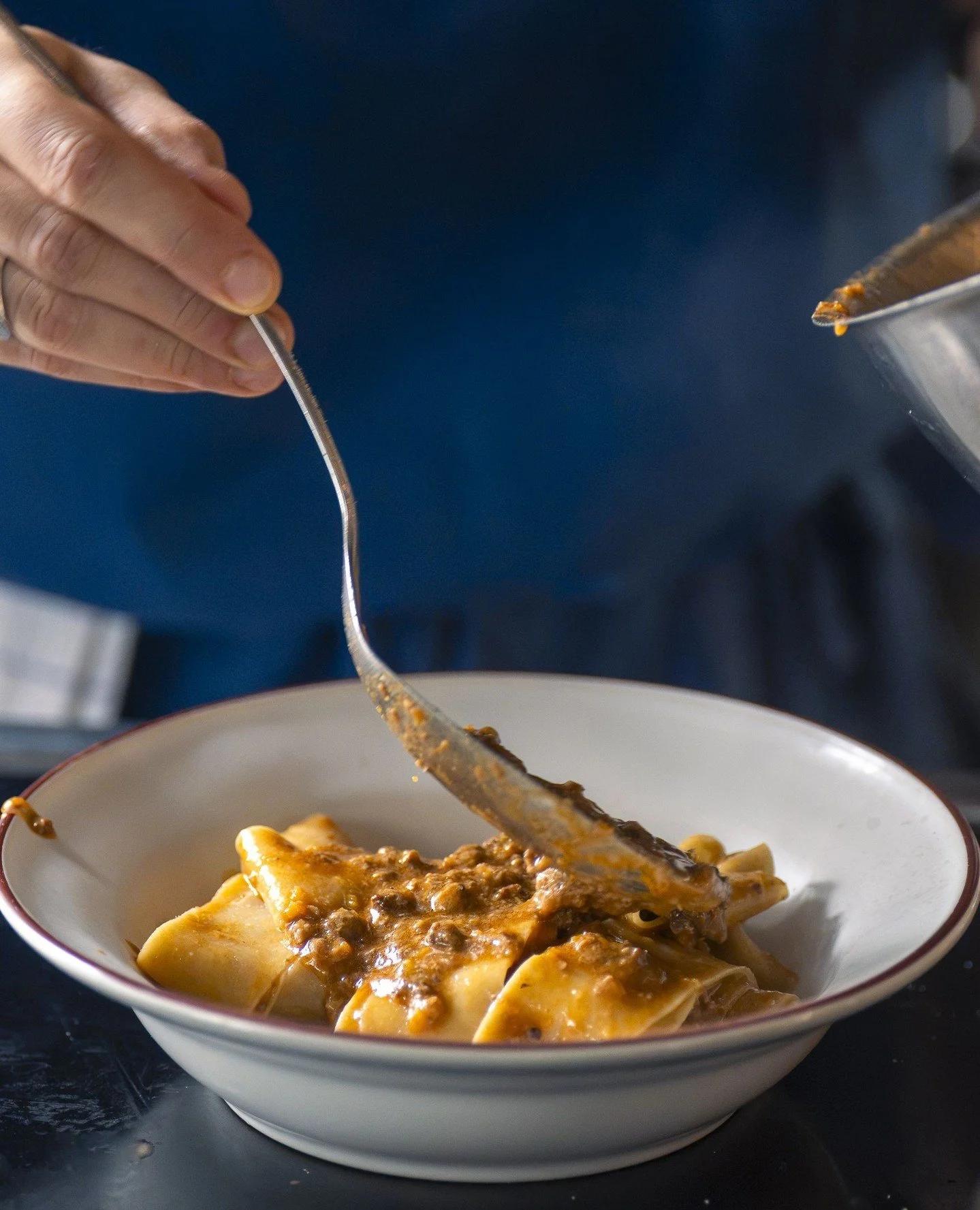 Pappardelle al rag&ugrave; &ndash; with homemade pasta and a ragu that's rich, deep and reason enough to stop by. 🤌