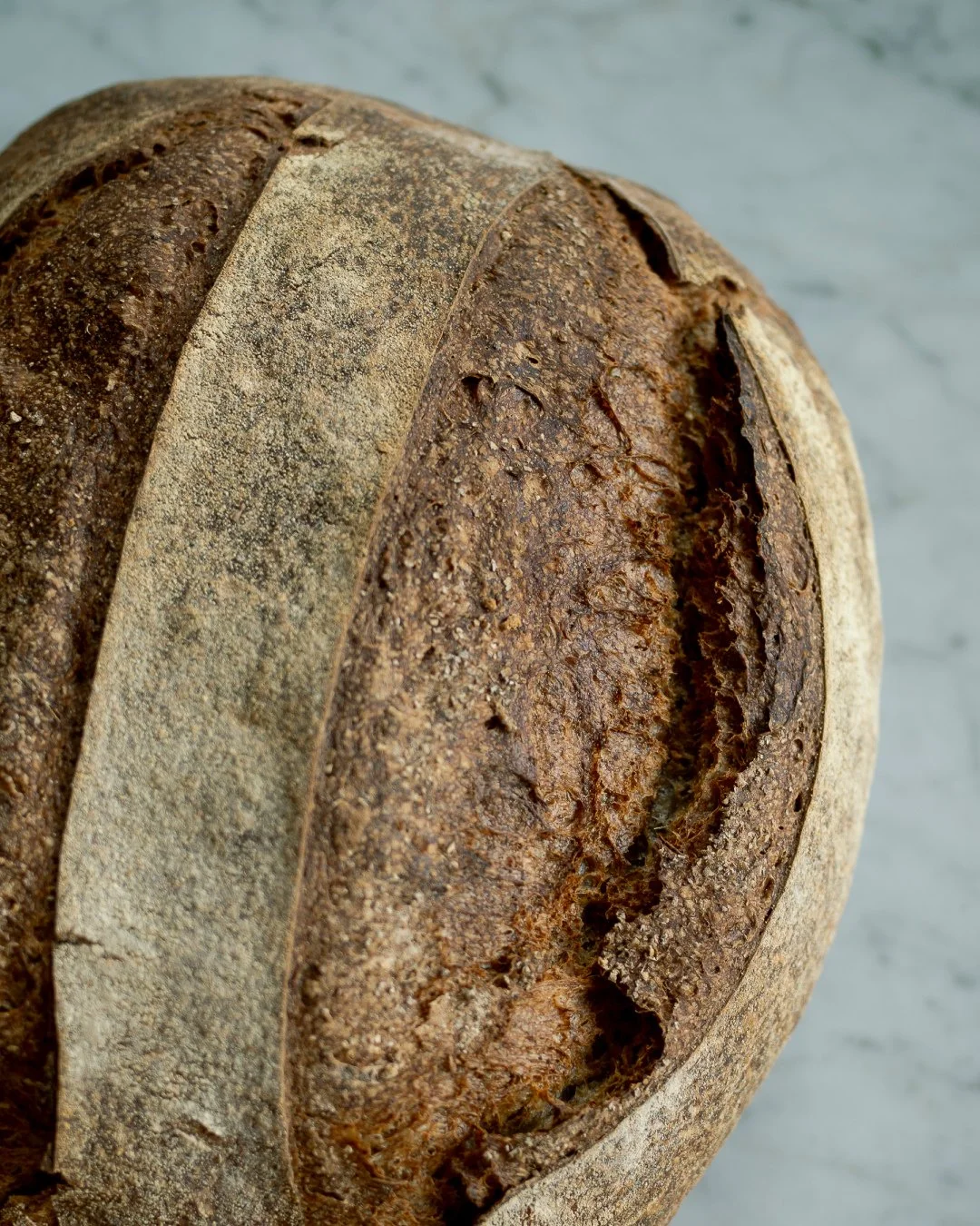 Fresh from the oven every day. The Mirabelle bread. Fresh sourdough bread from our own bakery, every day of the week, until the last loaf is gone. It's a big loaf, so one goes a long way and keeps the whole household fed for days.