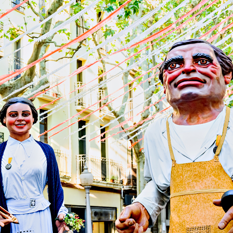 Image of large papier-mâché figures in Spain parade