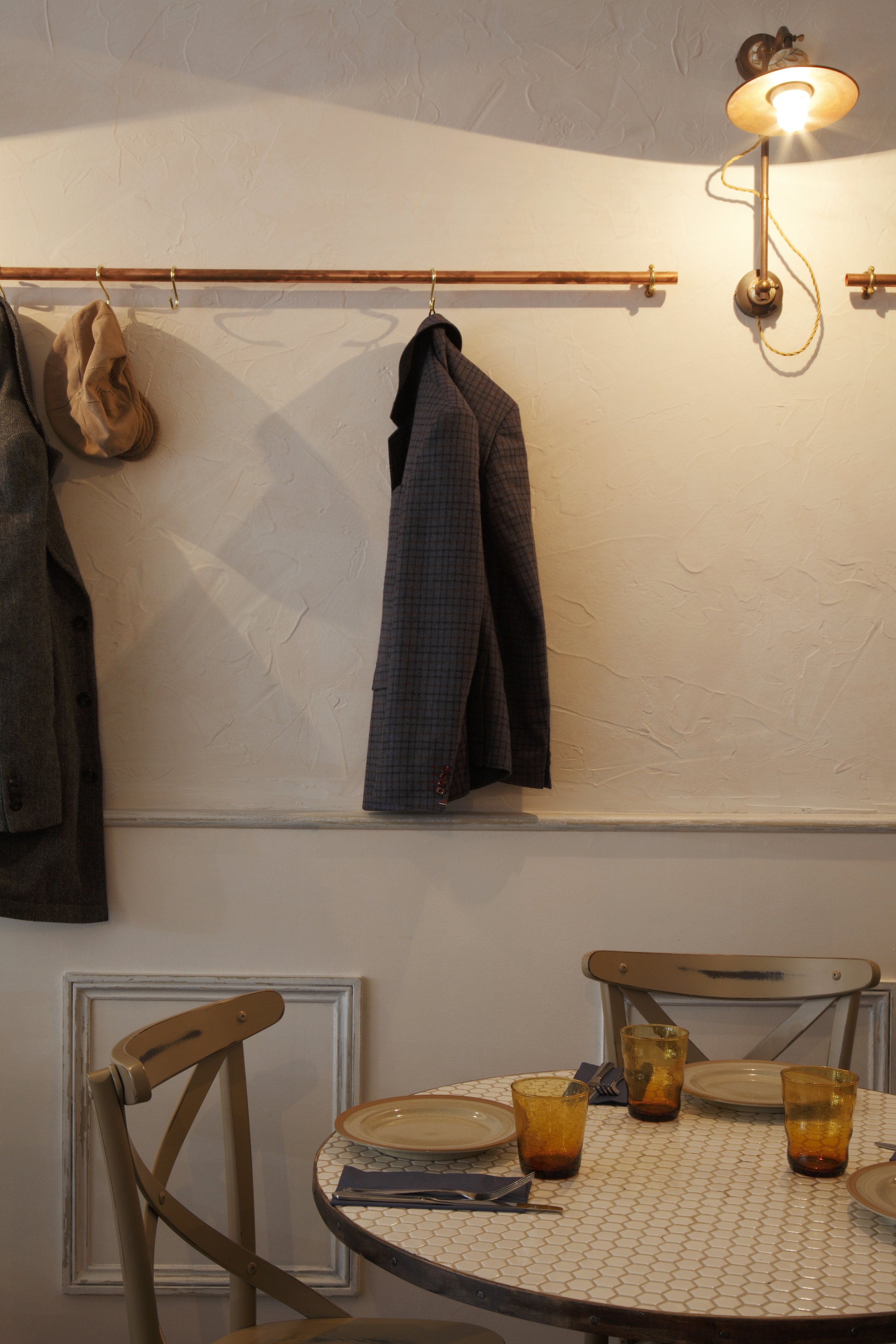 Dining area at Apulia, blending understated design with vibrant southern Italian hues