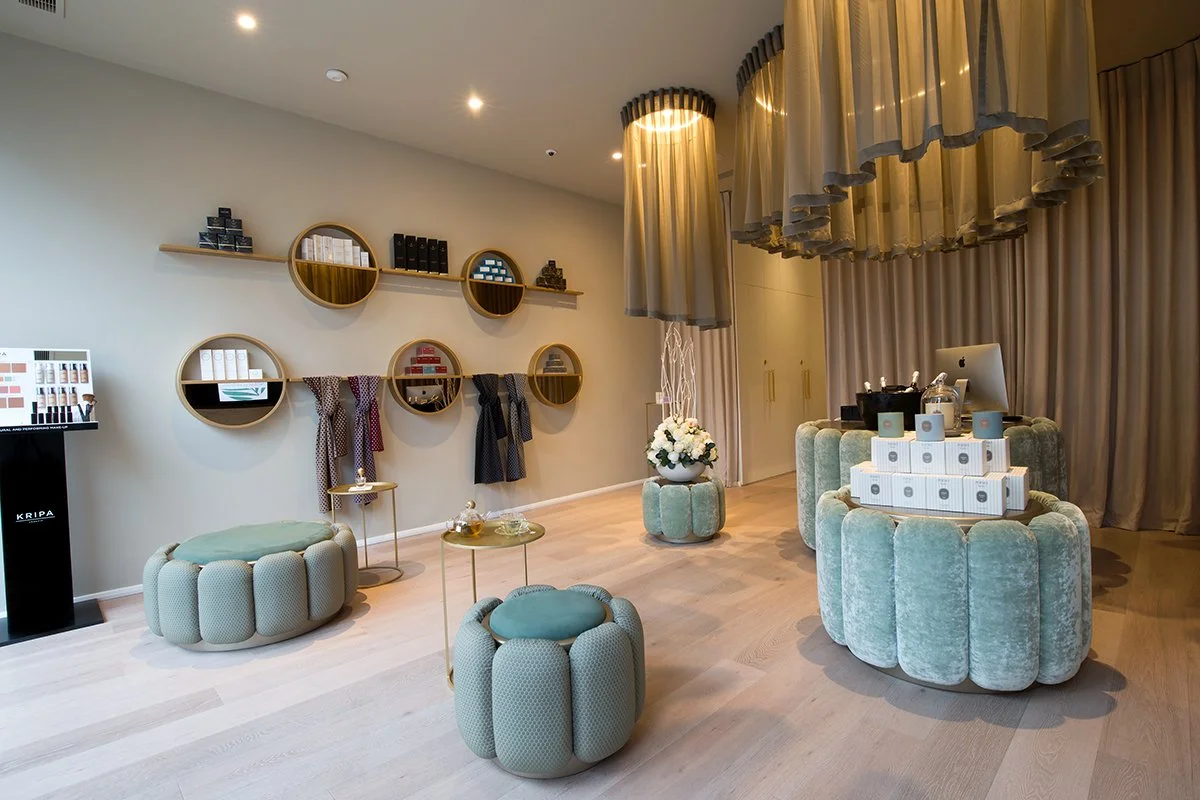 Interior of Ella Di Rocco spa, featuring a tranquil ambiance with soft lighting and sophisticated decor.