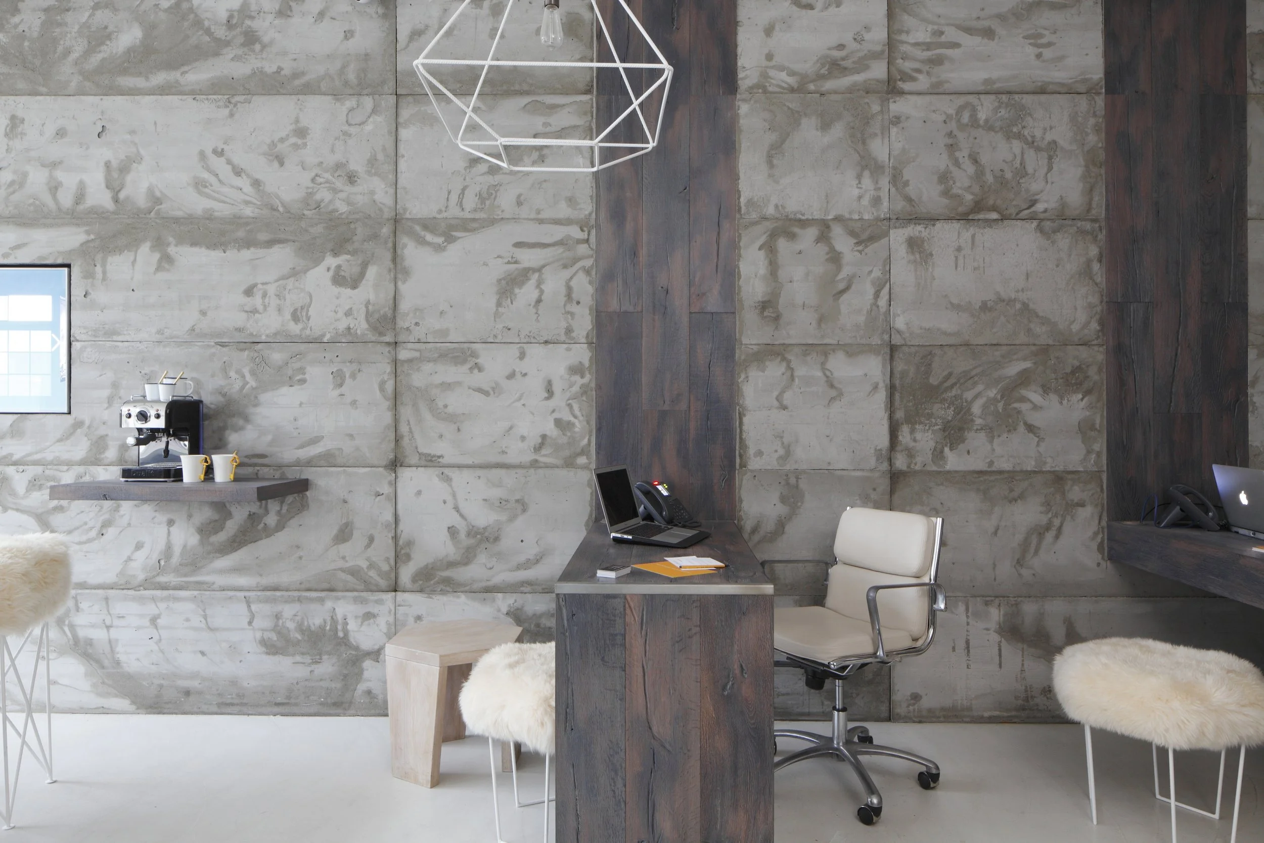 Concrete wall wooden desk I estate agency interior design I Stoke Newwington