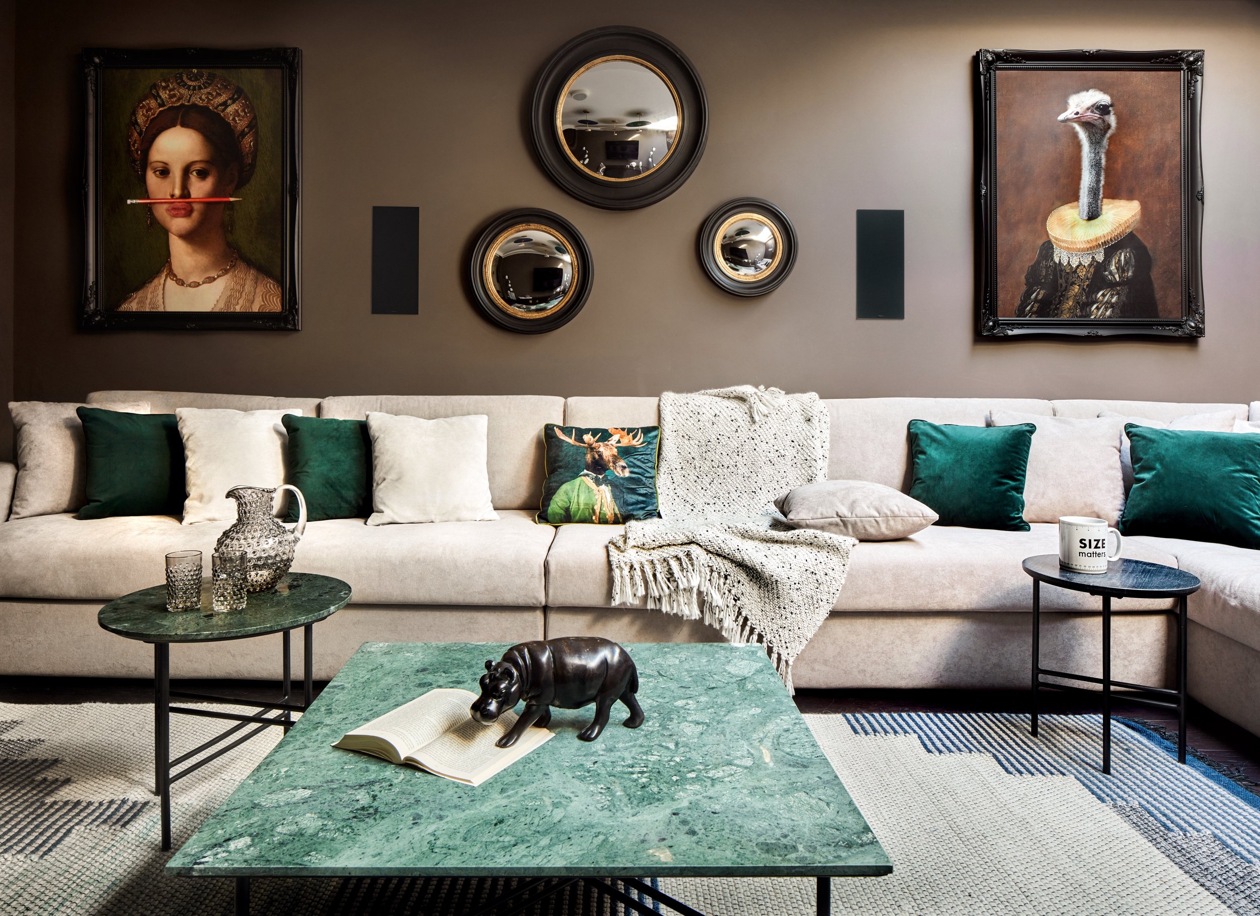 Wide view of the cinema room, highlighting the cohesive design and comfortable layout for family movie nights