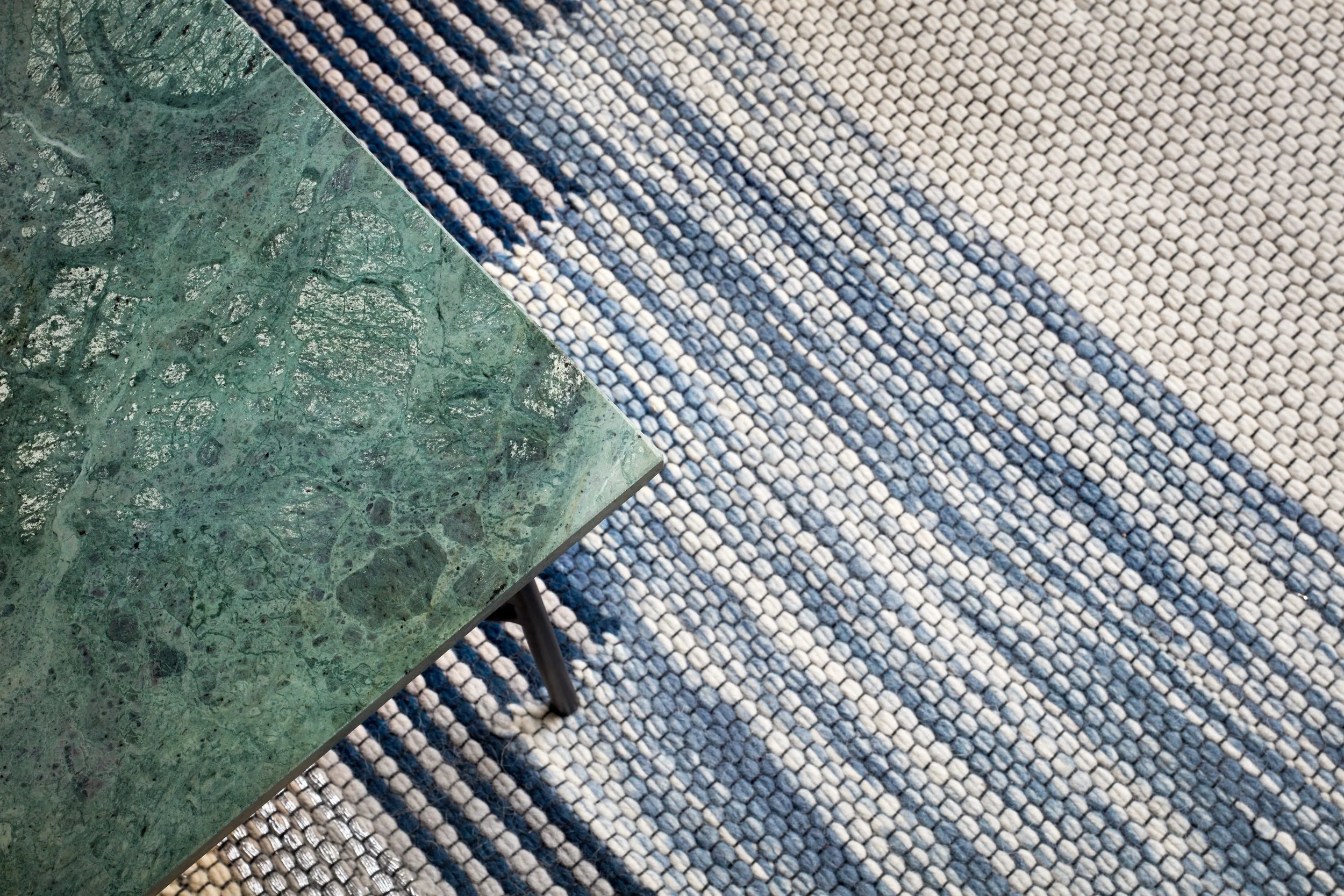 Detailed view of the cinema room, featuring bespoke furniture and a harmonious color palette