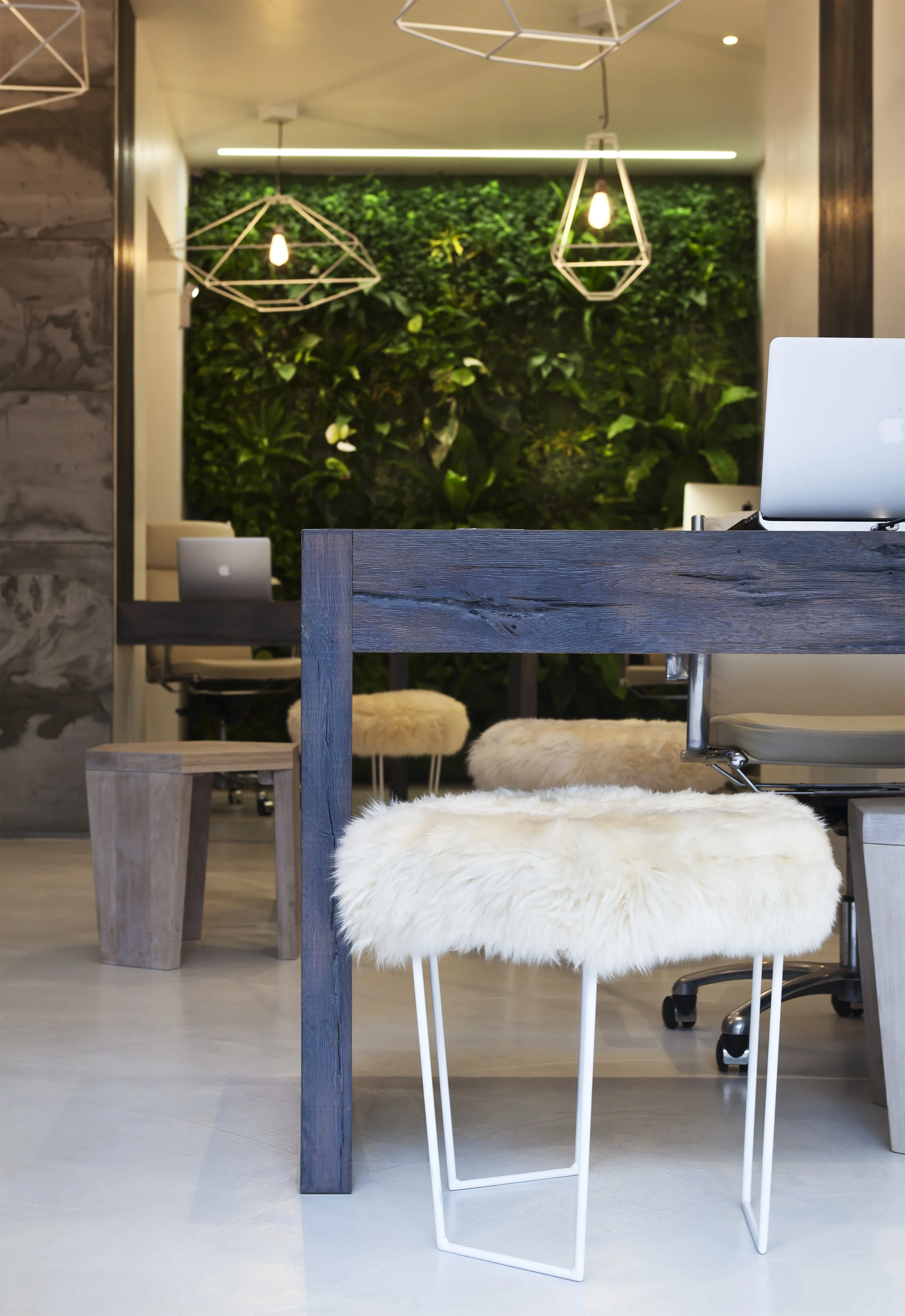 Detail of soft seating against industrial background I Bespoke seating I London