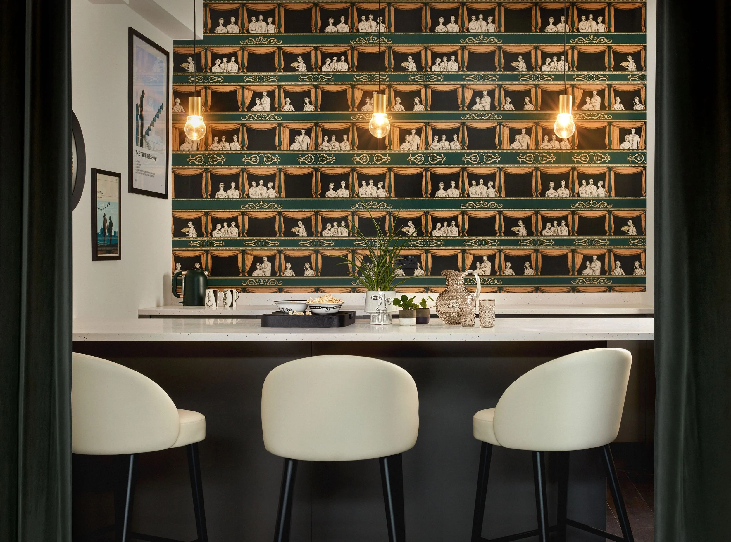 Cinema bar area with sleek wallpaper by Cole&Son, perfect for entertaining guests in the transformed basement space