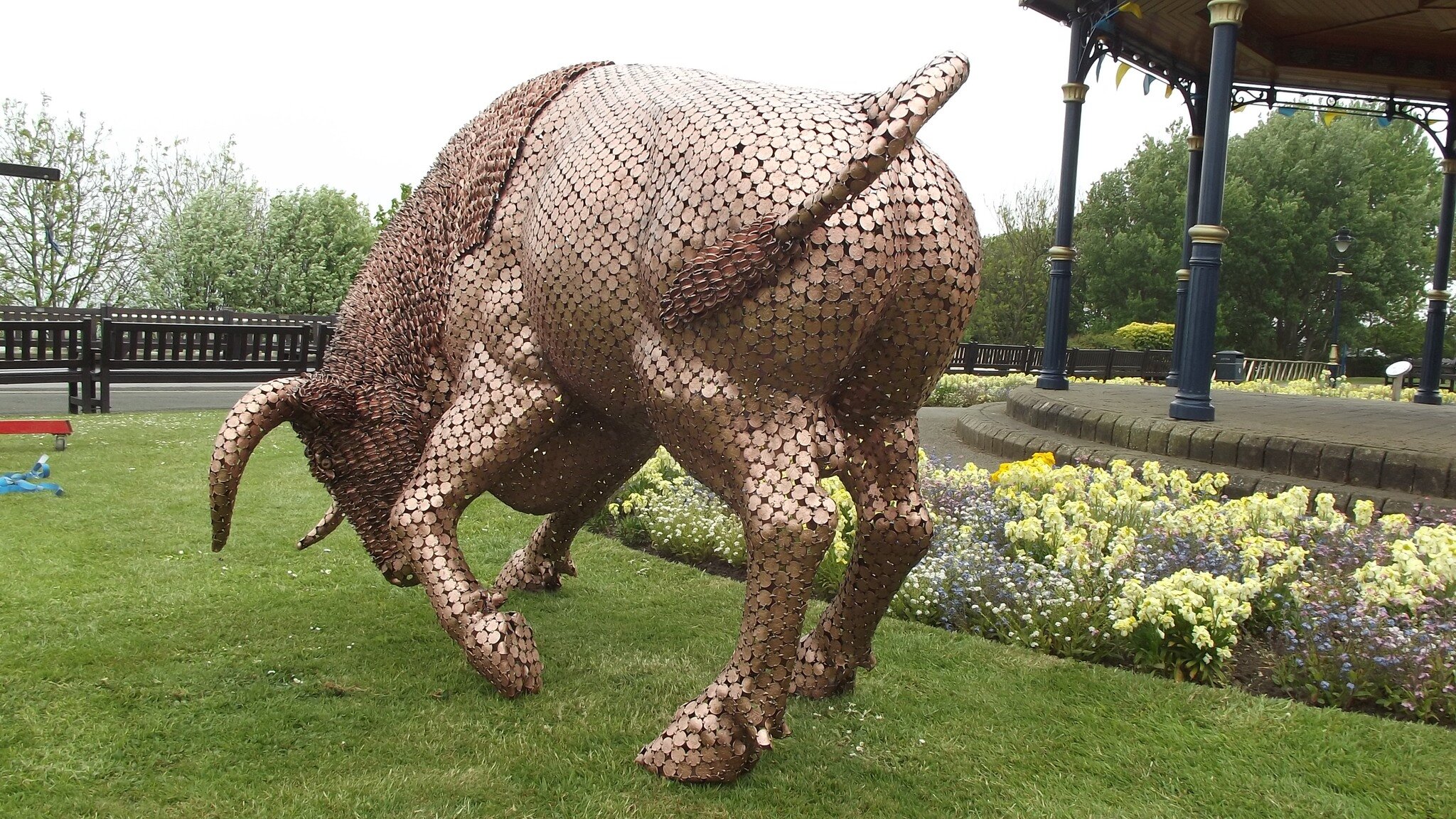 &quot;Bull,&quot; a  sculpture crafted by welding together 10,000 2p coins. This larger-than-life piece stands  at 200cm in length, 131cm in height, and 120cm in width.  With only 12 editions available worldwide, &quot;Bull&quot; is a unique and note