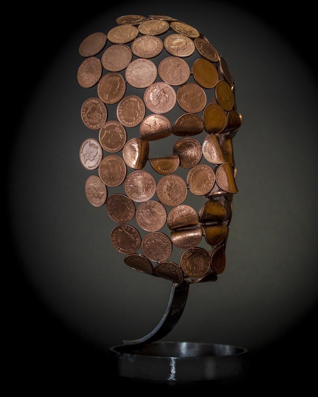 &quot;Small Head&quot; - A unique creation crafted from welded 2p coins, intricately folded to enhance its defining features. Perched atop a sleek stainless steel base, this piece embodies artistry and innovation.

#CoinArt #Sculpture #CreativeDesign