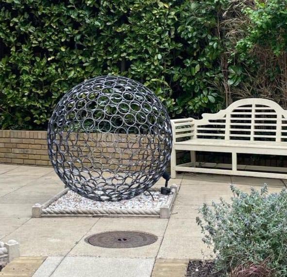 Another happy customer delighted by the unique charm of the Sphere! Crafted from sliced steel pipes welded together from the inside, it radiates timeless elegance and contemporary allure. 
#SculptureSphere #SteelCraftsmanship #TimelessElegance