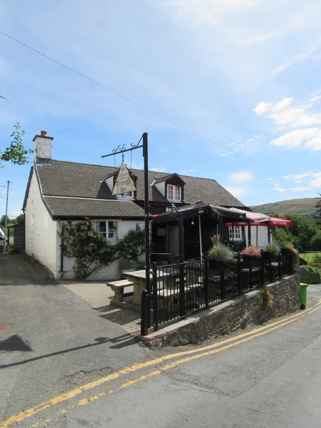 During my holiday in Builth Wells, I went on a drive one day up to Rhayader, where I spotted this lovely little inn tucked away on a slope behind the Groe.

The park sits alongside the River Wye, where there is a nearby ford that was once an importan