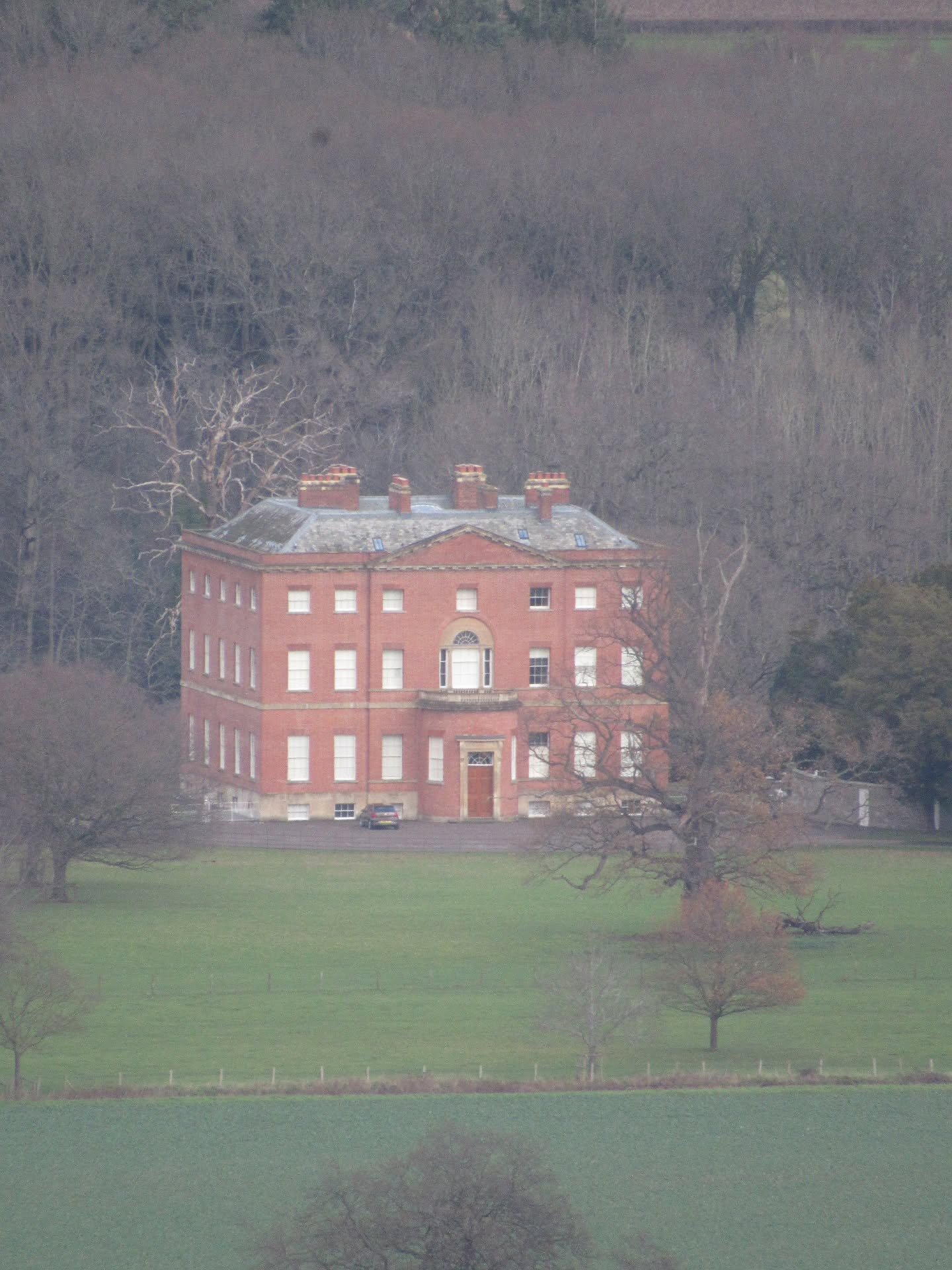 As I took a stroll around Gillian's Wood with the dog today, I managed to snap this photo of Moccas Court from afar. Honestly, it's a miracle I got the shot, as along with my already shaky hands, the lead was repeatedly being tugged on by my very imp