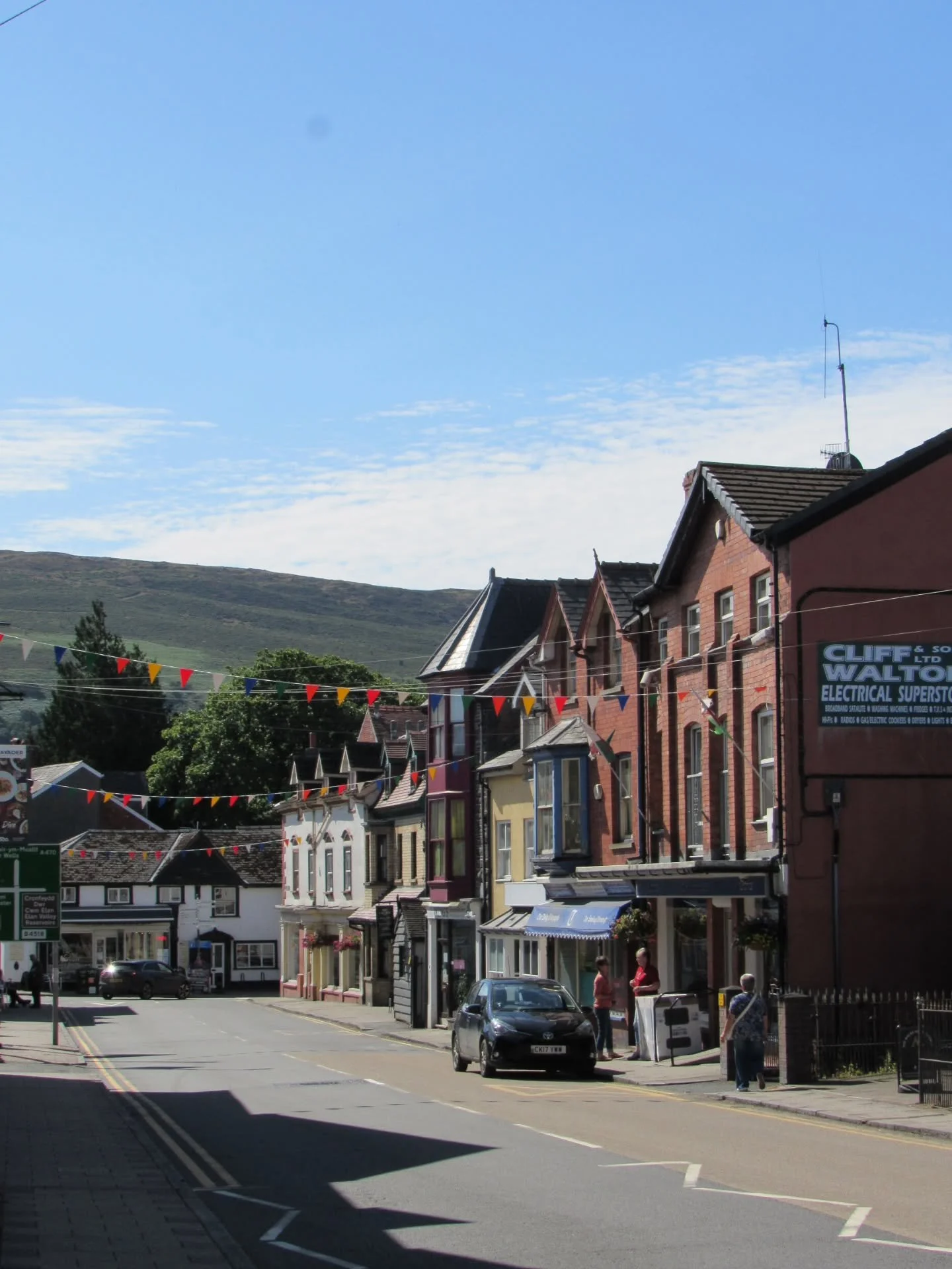 Whilst I was staying in Builth Wells last summer, I decided to drive up to the little Welsh market town of Rhayader. I had seen it mentioned in my books, especially for its once famed waterfall, and so was curious to see the place in person.

It was 