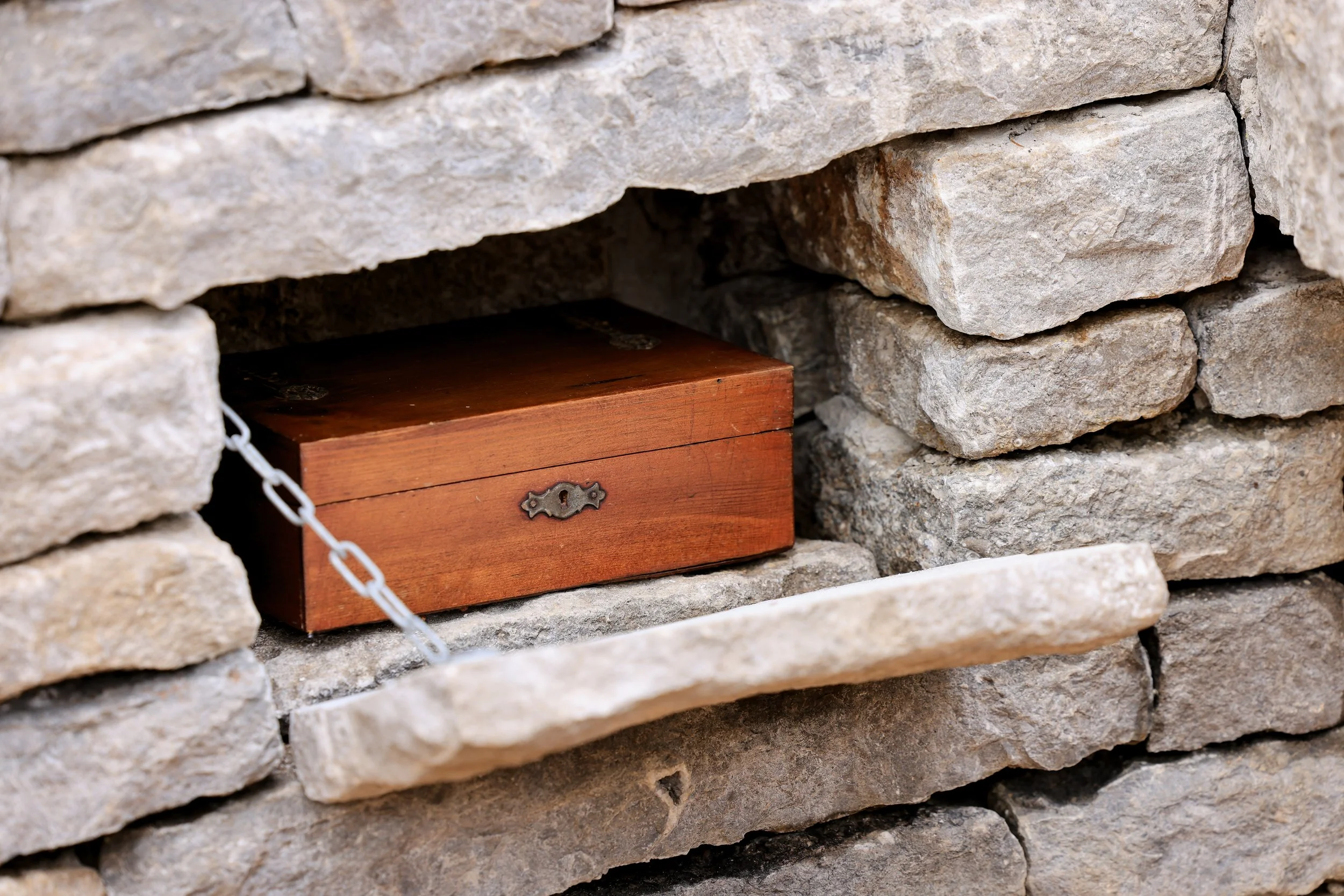 A secret compartment concealing Lady Whilstledown's quill and parchment (from the show) was hidden in the drystone walls, signifying the secrets Penelope held.