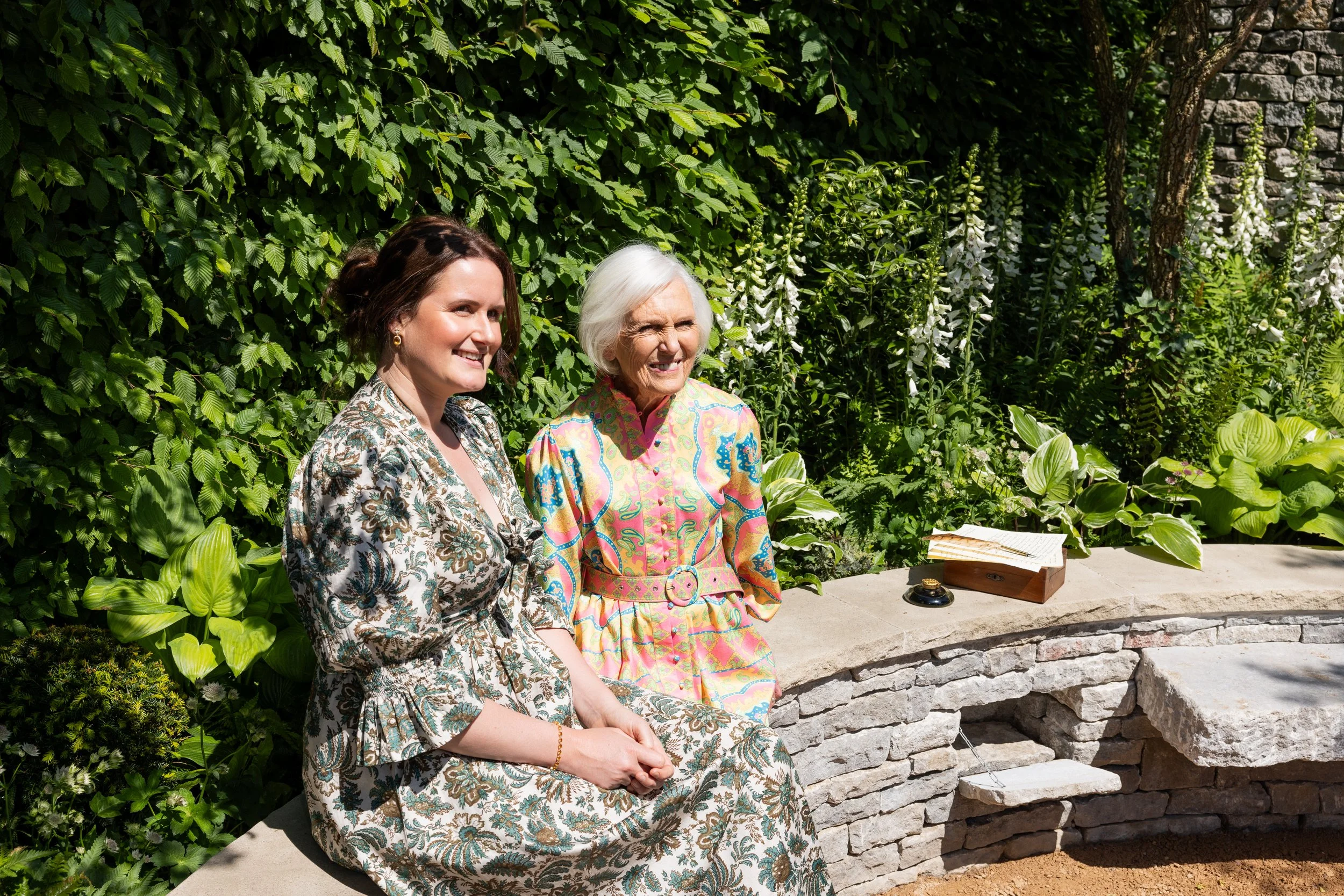 Designer Holly Johnston and Dame Mary Berry in the Bridgerton Garden.