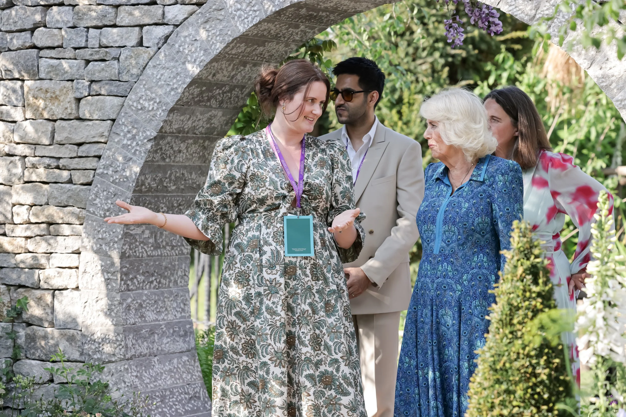 Designer Holly Johnston shows Her Majesty Queen Camilla around the Bridgerton Garden.