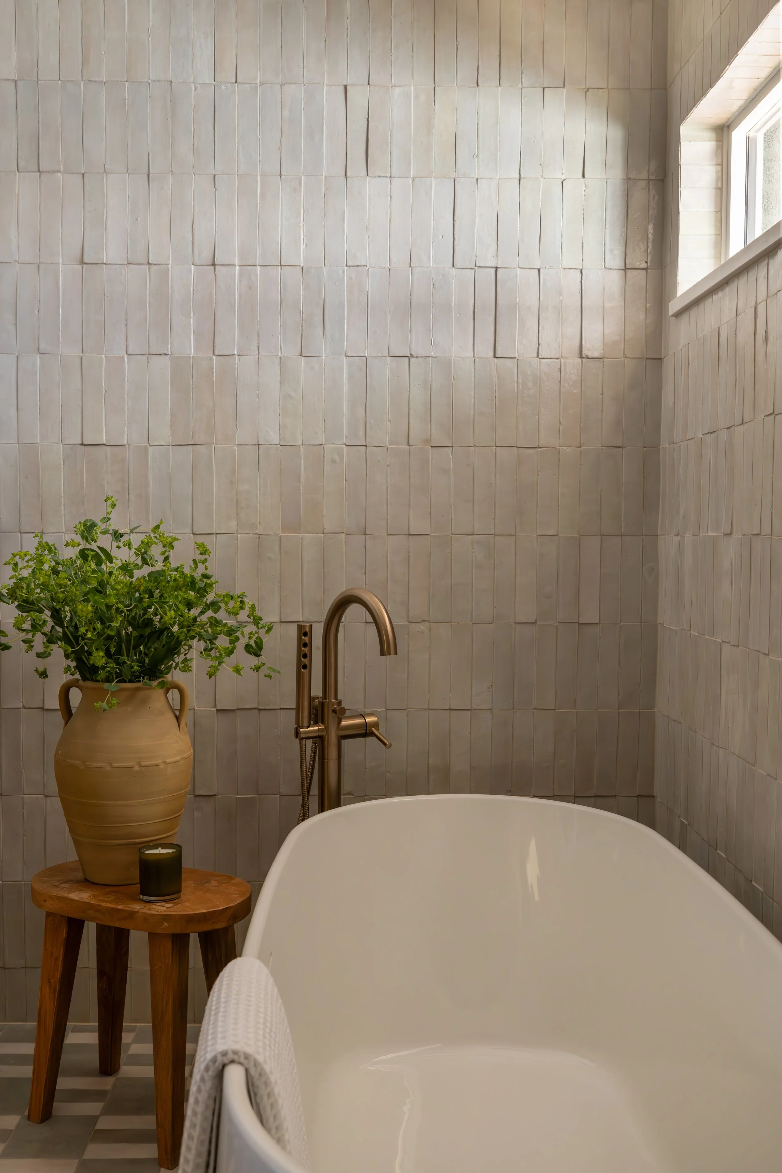 Luxurious primary bathroom bathtub