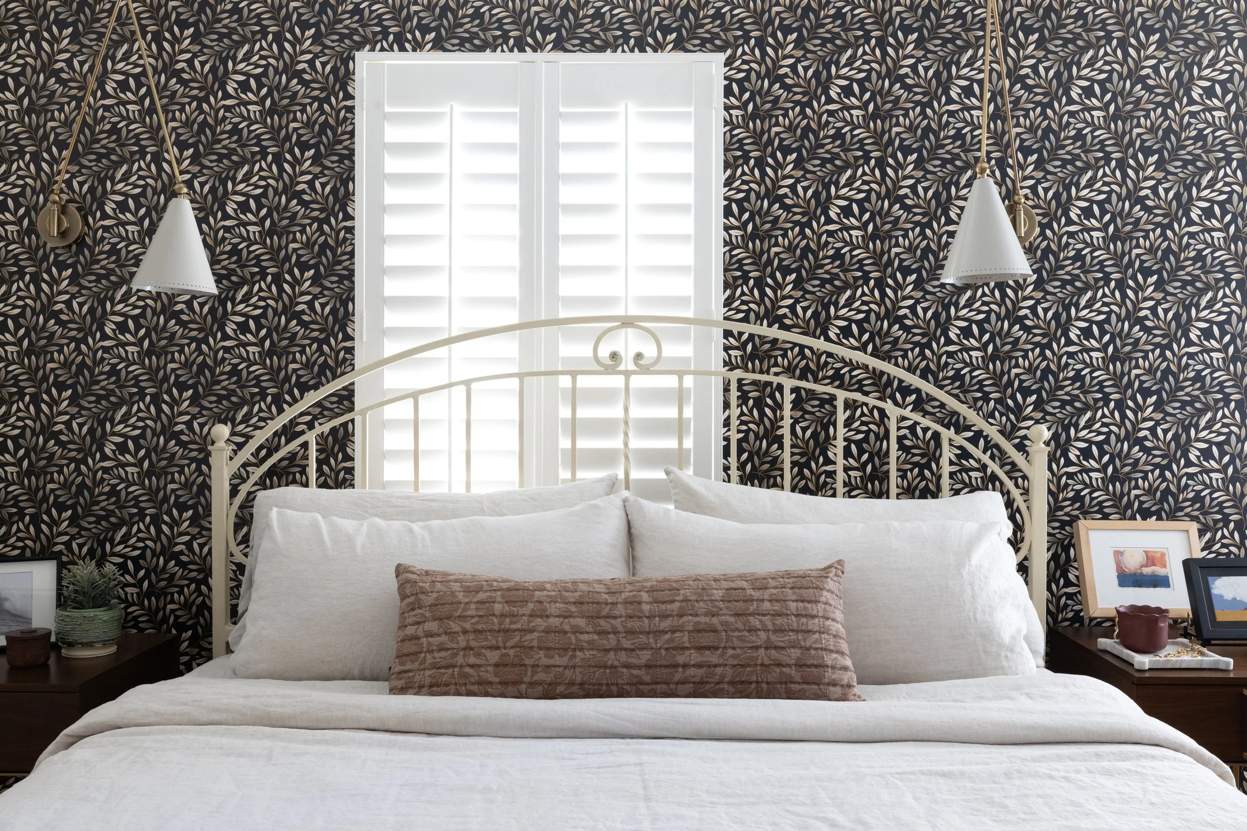 primary bedroom with wallpaper