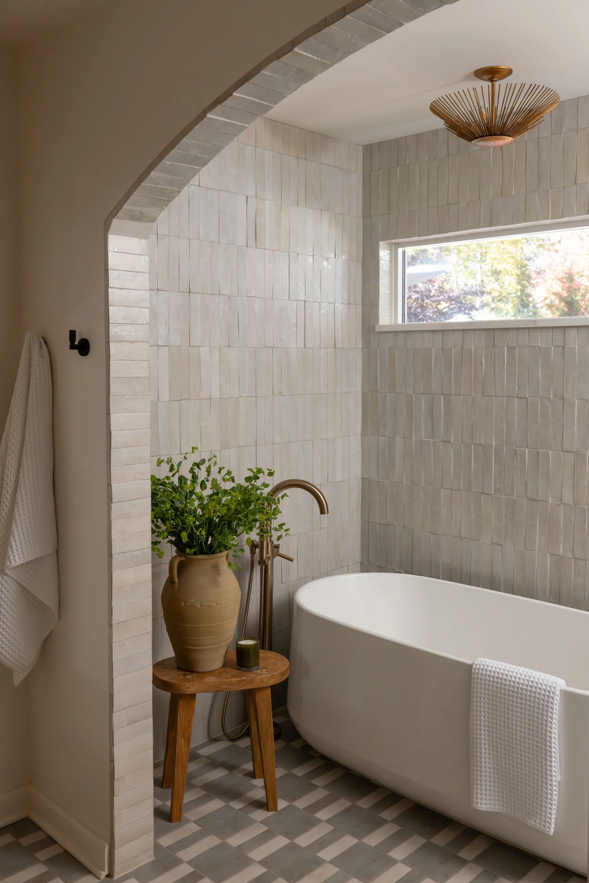 luxurious calming wet room with arched entry