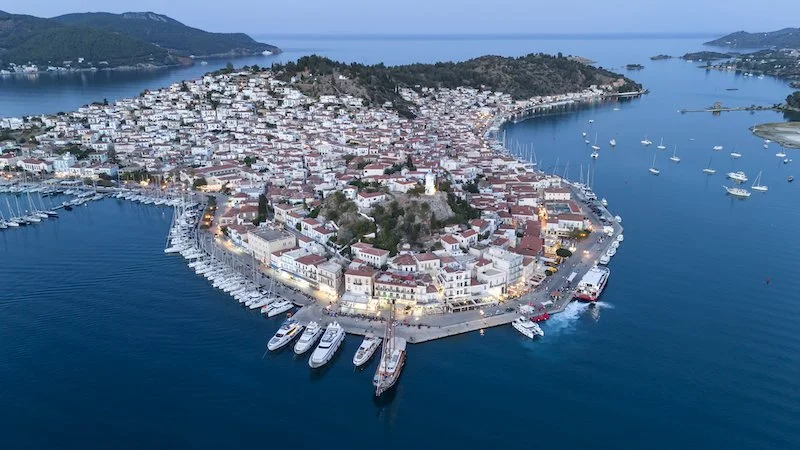aerial-panorama-of-the-city-and-harbor-of-poros-is-2025-02-11-19-06-32-utc.jpg