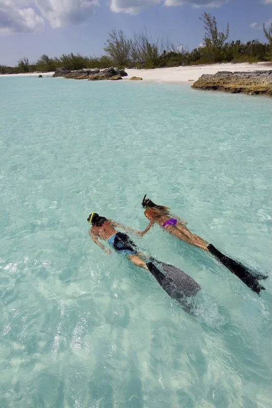 two-people-snorkeling-in-crystal-clear-turquoise-w-2025-04-05-03-50-50-utc.jpg