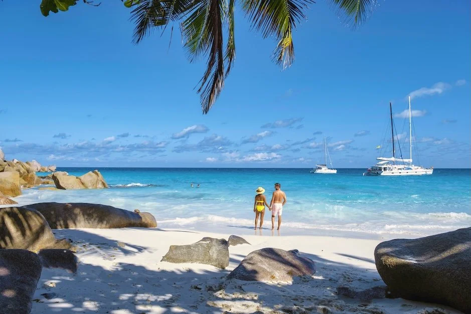 couple anse pralin seychelles on their yacht vacation