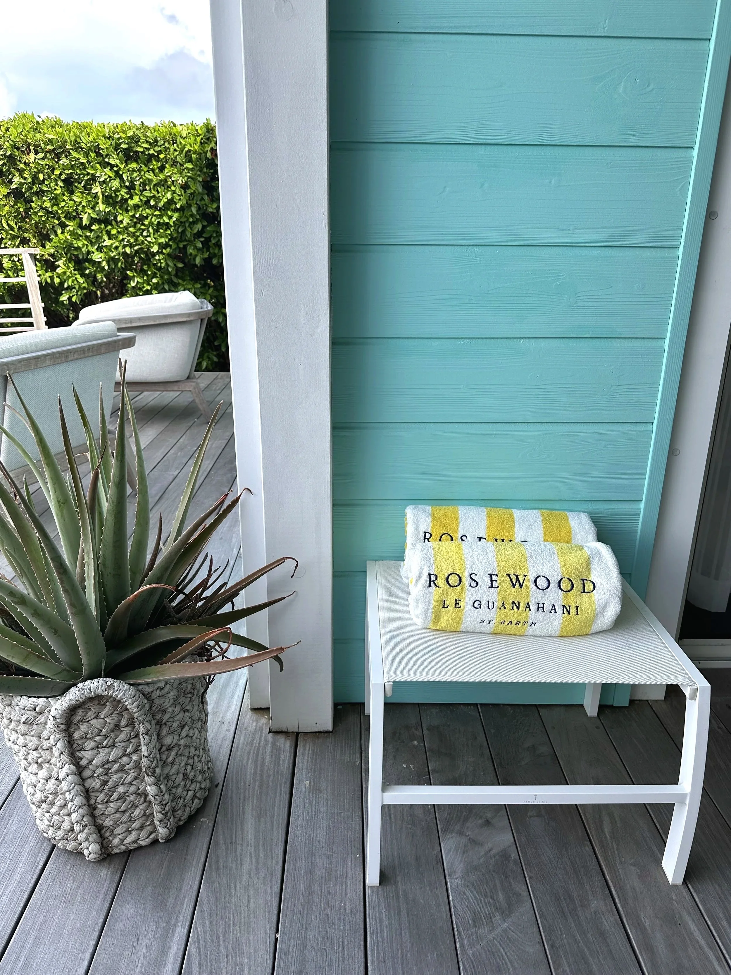 Pool towels on the deck of a bungalow at Rosewood Le Guanahani in St Barth