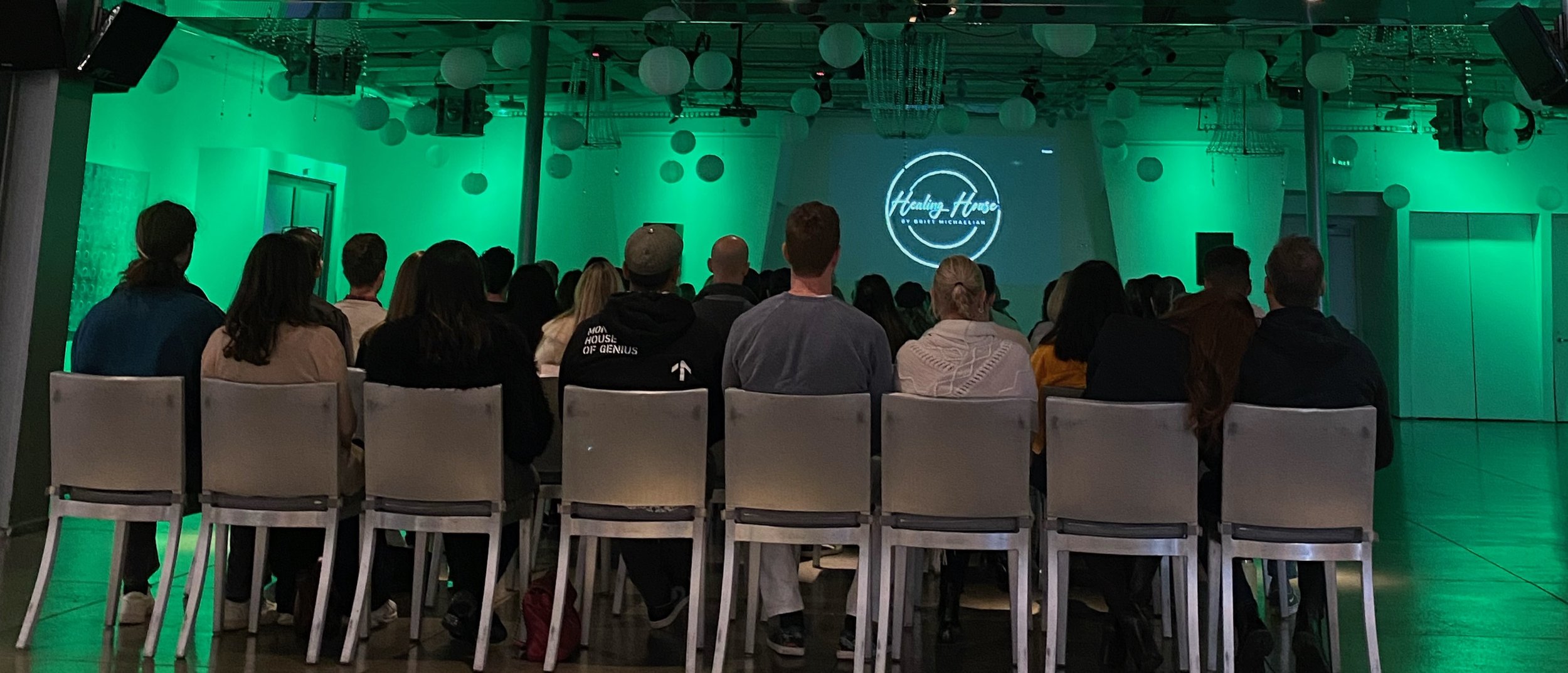 Healing House seated guests green light.jpeg