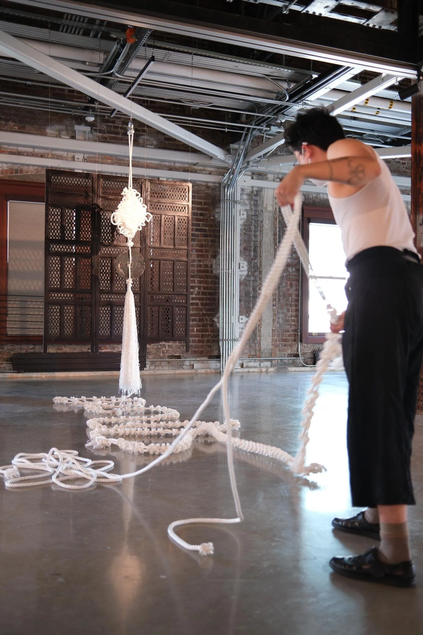Live knot tying at ARTS at King Street Station.
