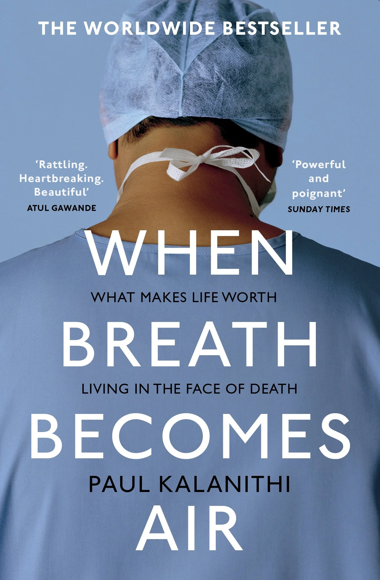 Book cover featuring a person in medical scrubs and a surgical cap, with the title 'When Breath Becomes Air' by Paul Kalanithi, and quotes praising the book.