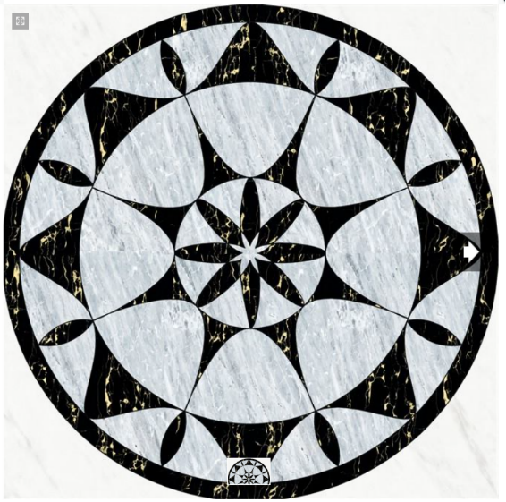 Intricate circular geometric mosaic design with black and white elements, featuring star-like patterns and curved shapes.