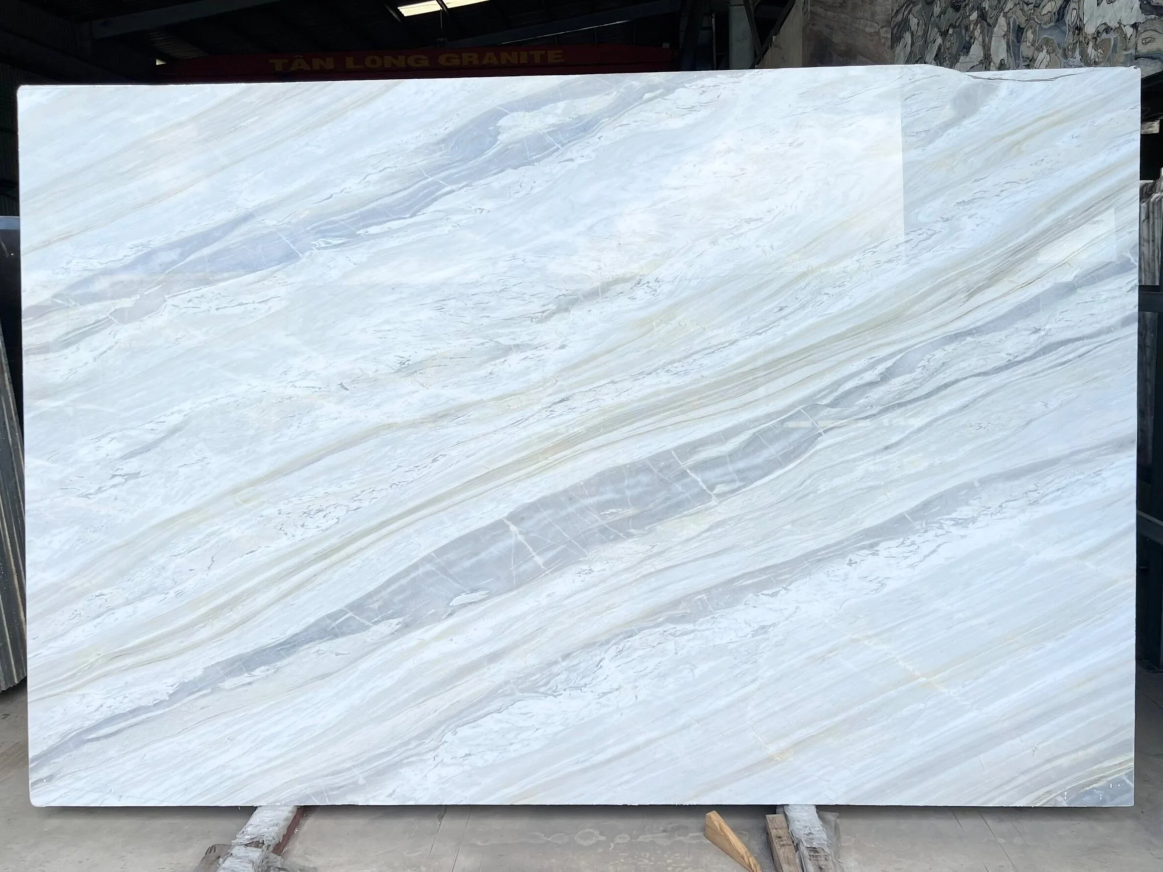 Large slab of light grey marble with white veins