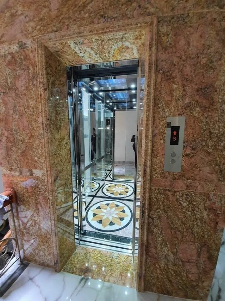 luxurious elevator with ornate interior and glossy marble walls