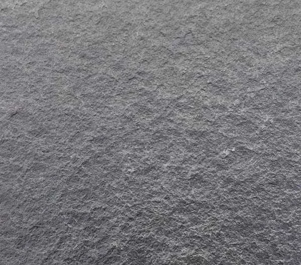 Gray textured stone surface close-up