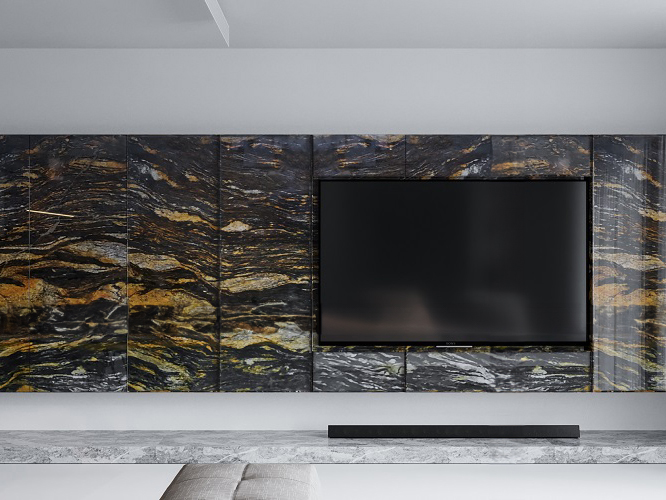 Modern living room with black marble accent wall, mounted flat-screen TV, and sleek soundbar.