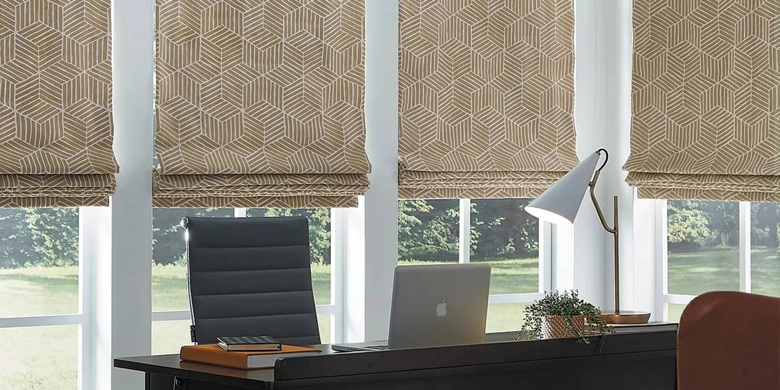 Carole Fabrics Roman shades in a home office