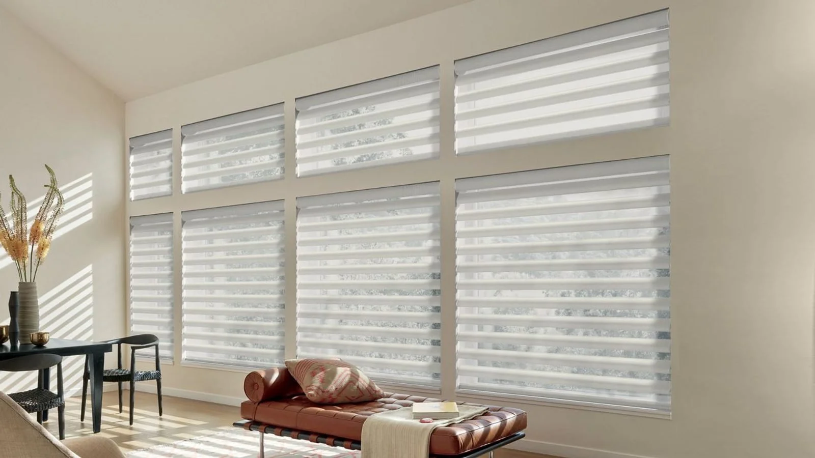 Hunter Douglas Pirouette window shadings in a sunroom