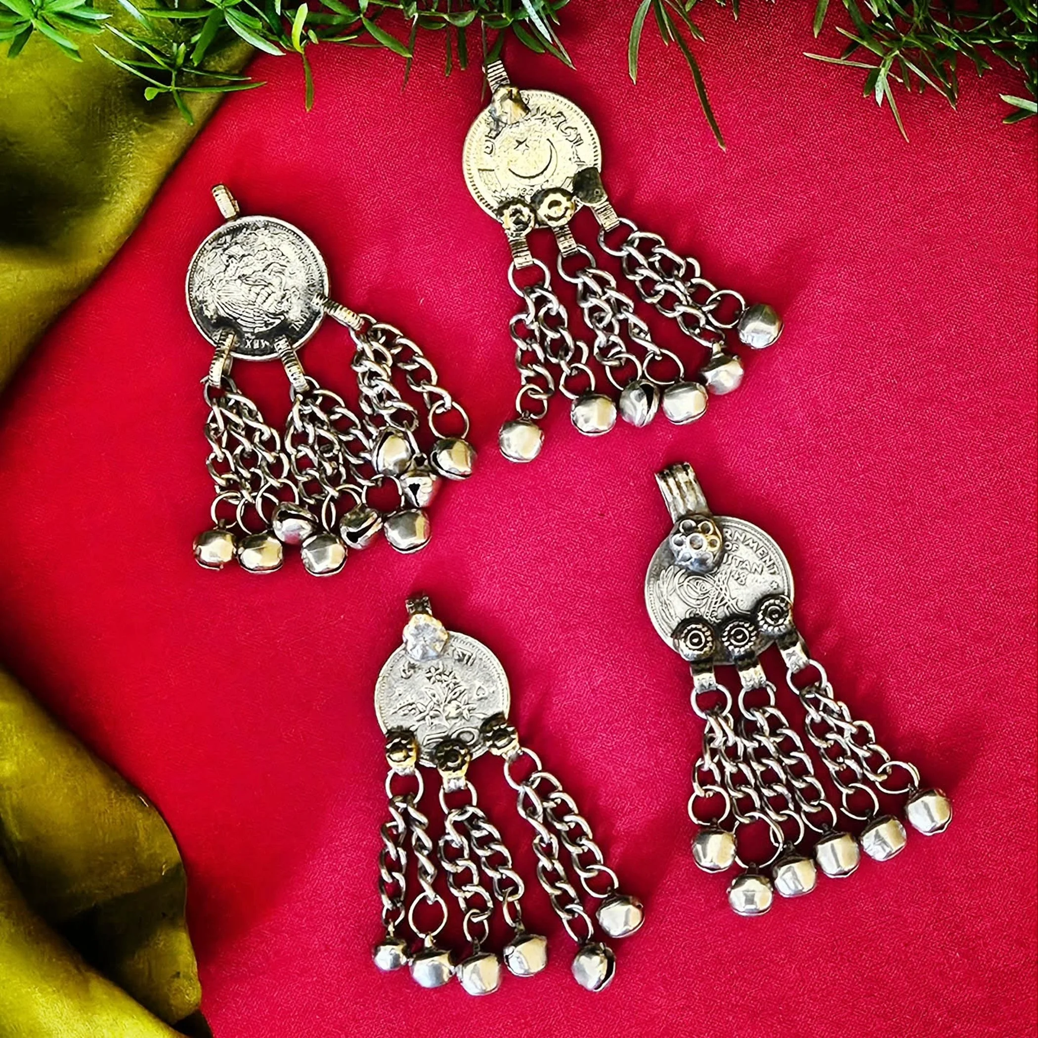 Four Kuchi Coin Pendants
