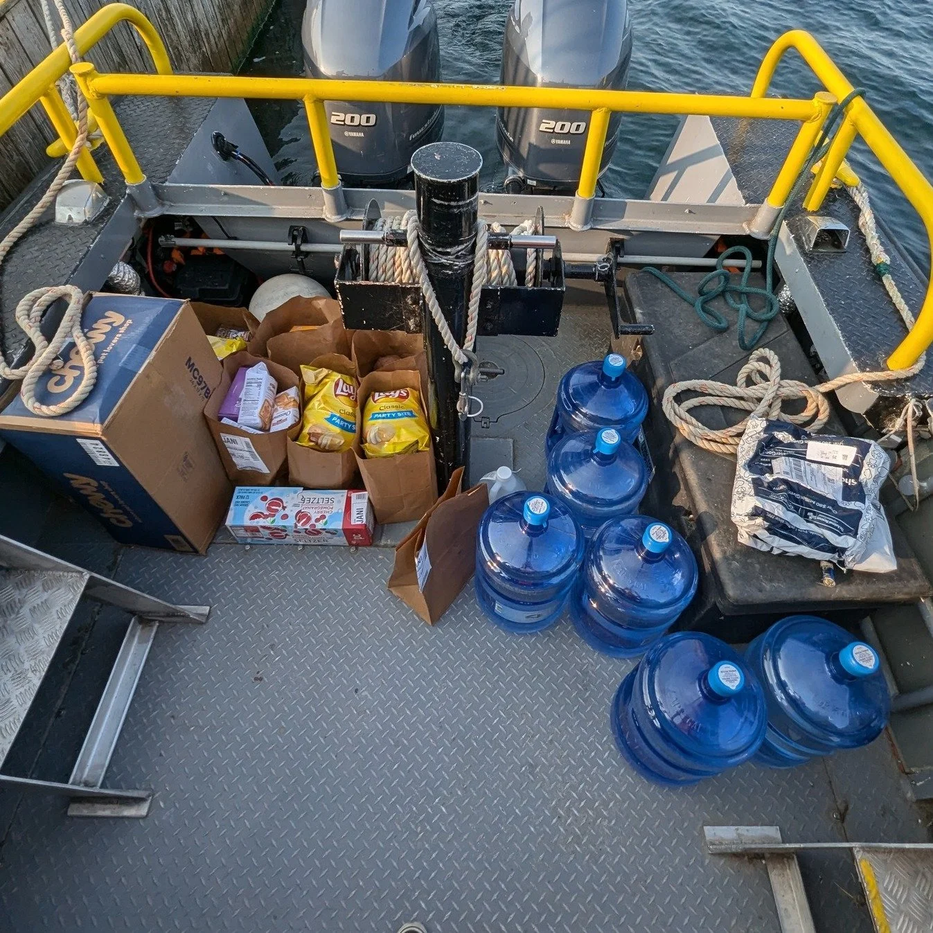 Have you heard of the Grindstone Cargo Club? 

Every Tuesday RJM sends a vessel to the UTL and back between 0800-0900. Reservations are required and take priority, after that it is first come first served. Services offered during this time include: 
