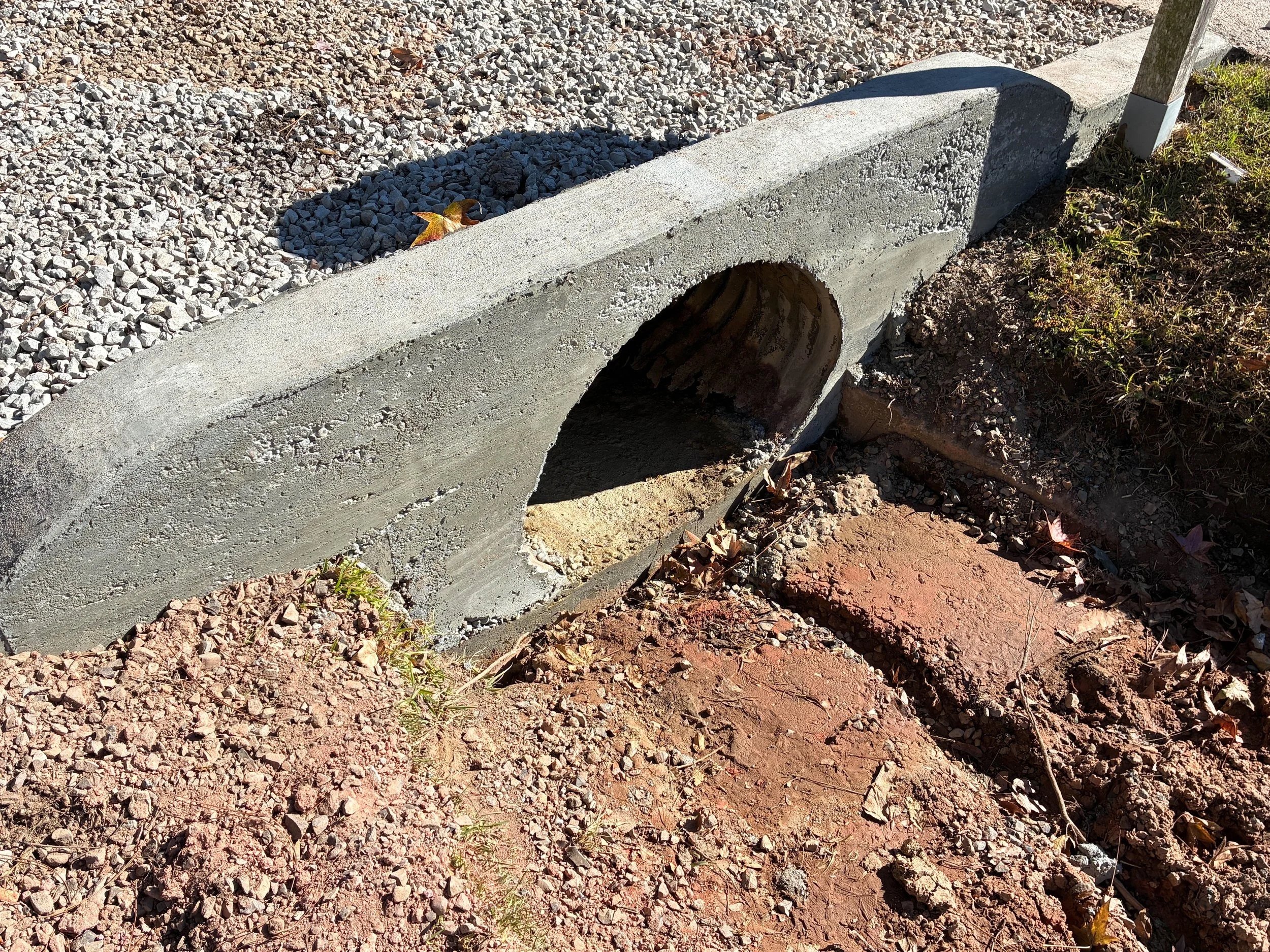concrete over sewer hole