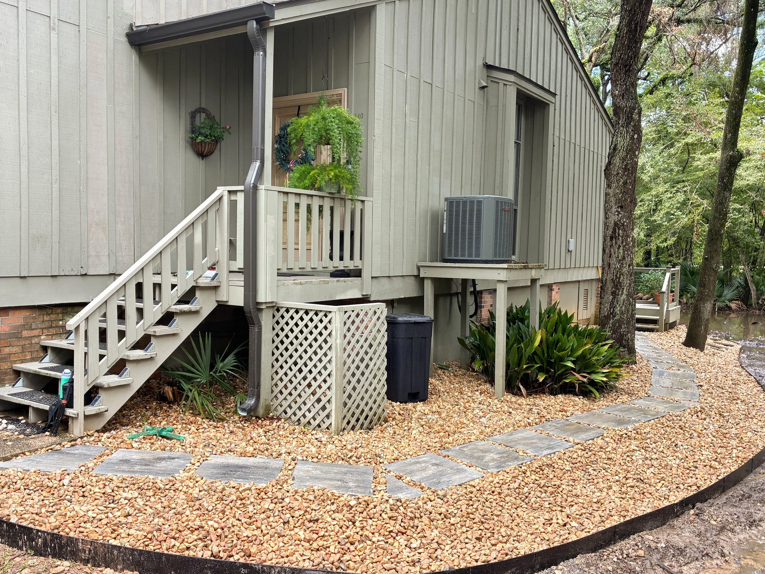 paver walkway wrapped around house