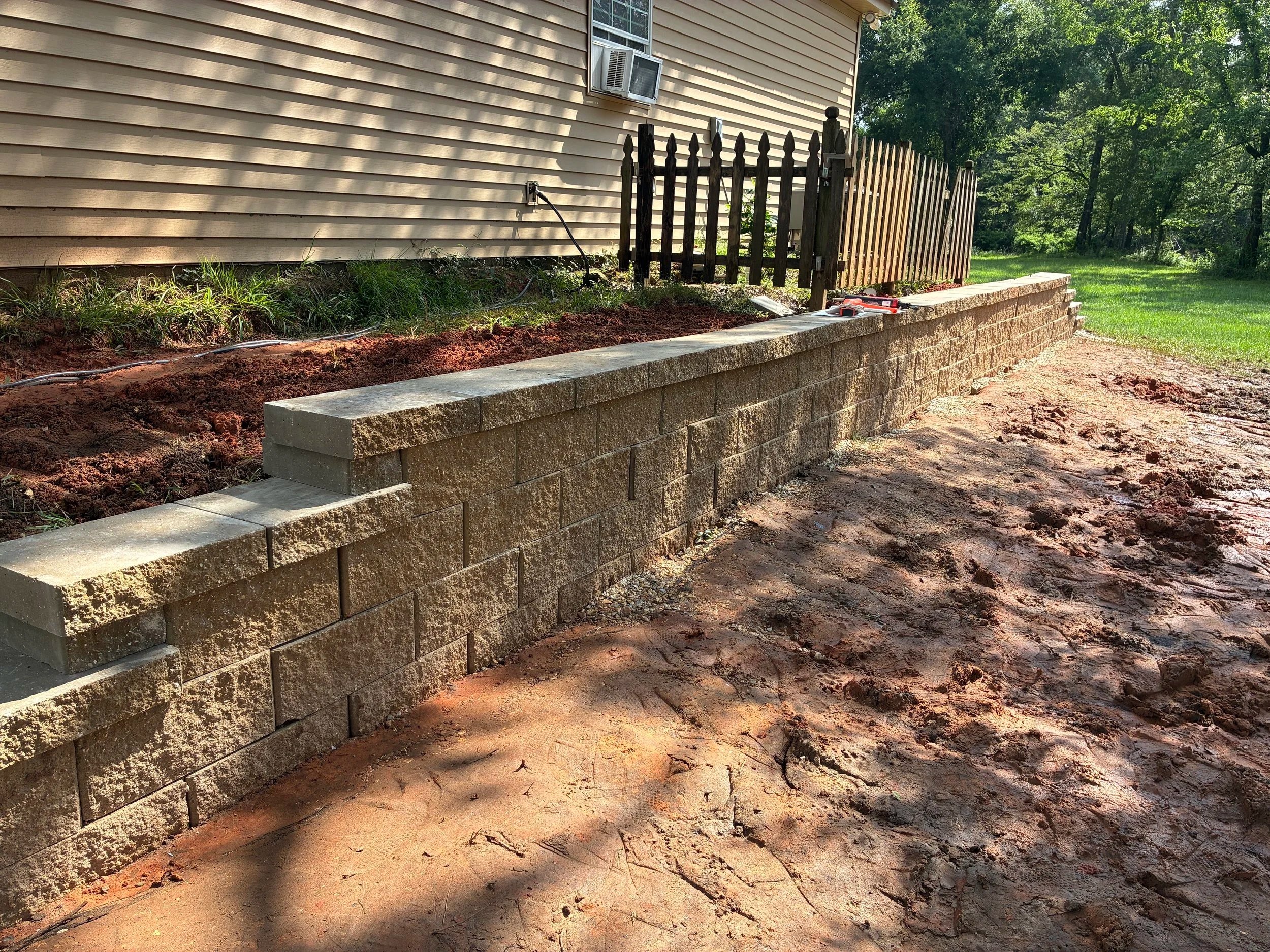 full picture of 4 brick high retaining wall